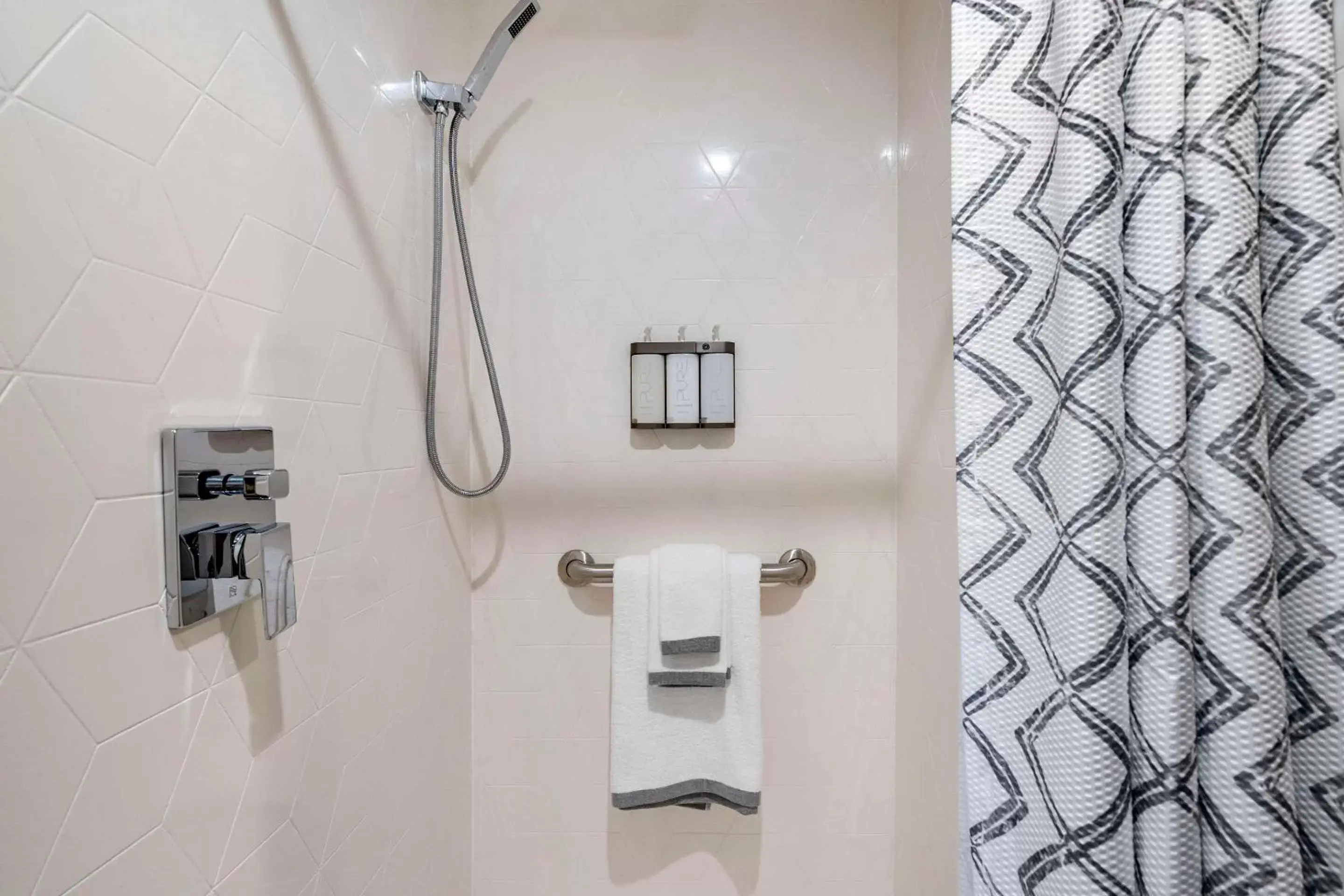 Shower, Bathroom in Cambria Hotel Orlando Universal Blvd