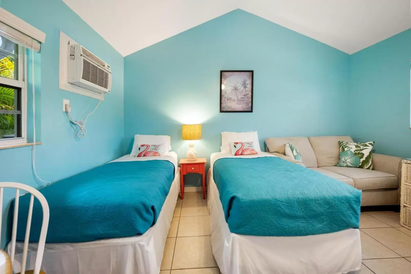 Bed in Seahorse Beach Bungalows