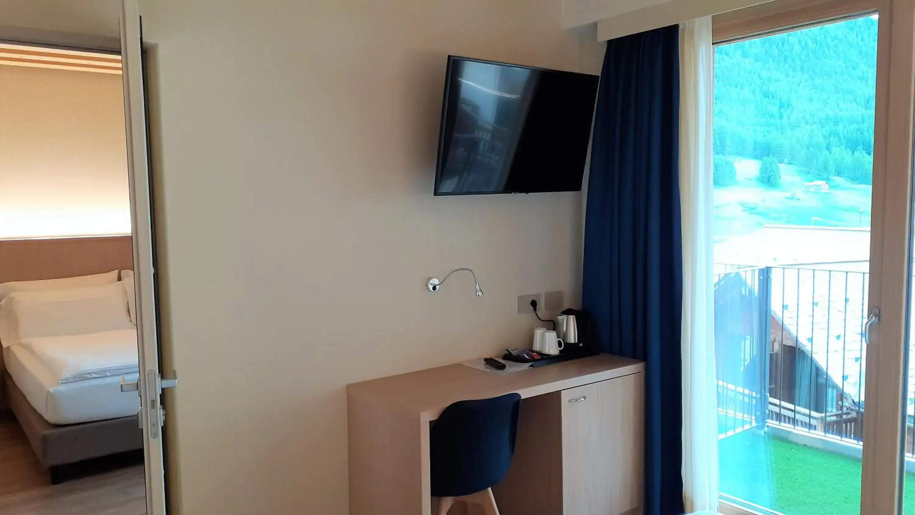 TV and multimedia, TV/Entertainment Center in Livì Family Hotel