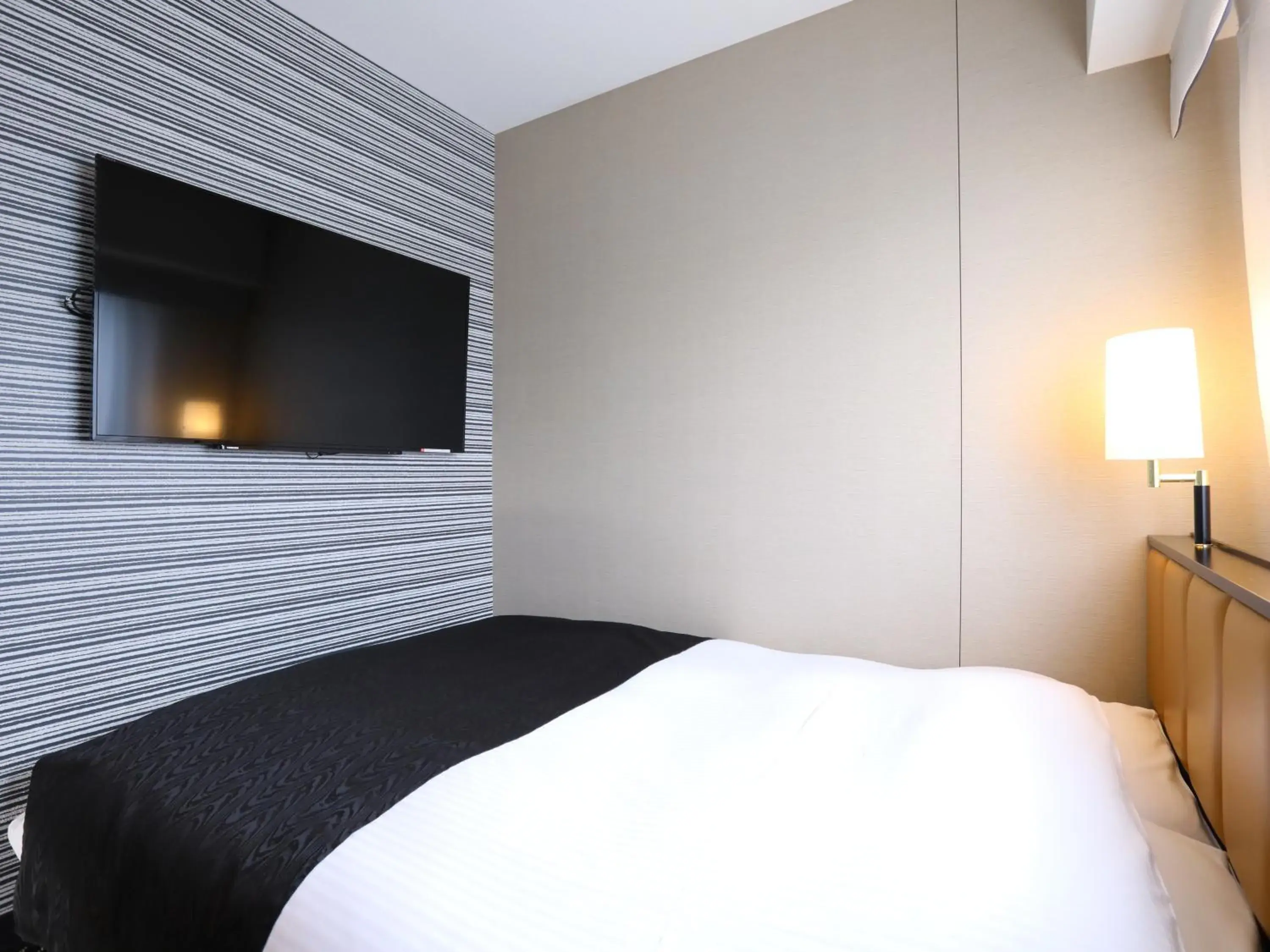 Photo of the whole room, Bed in APA Hotel Ueno Ekikita