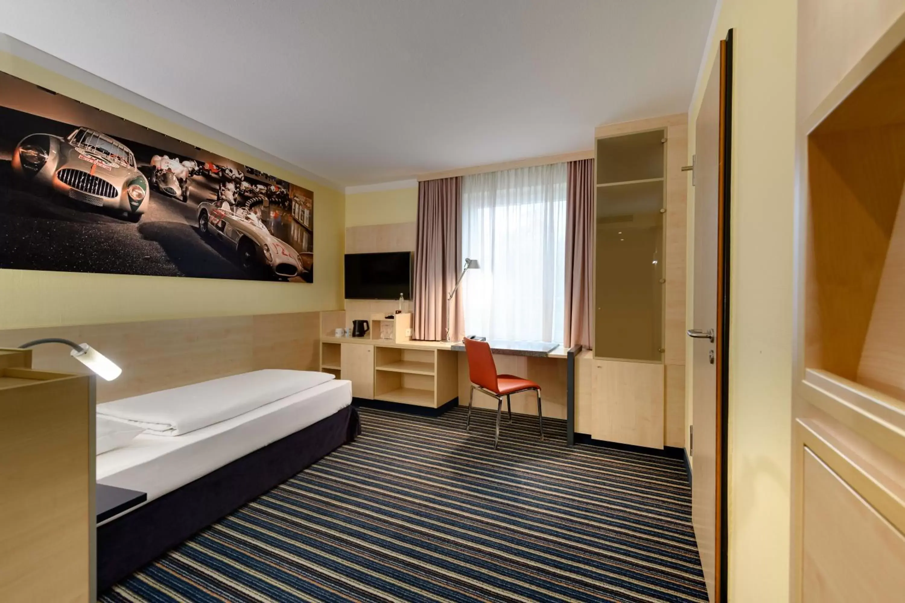 Photo of the whole room, Bed in Mercure Hotel Stuttgart City Center