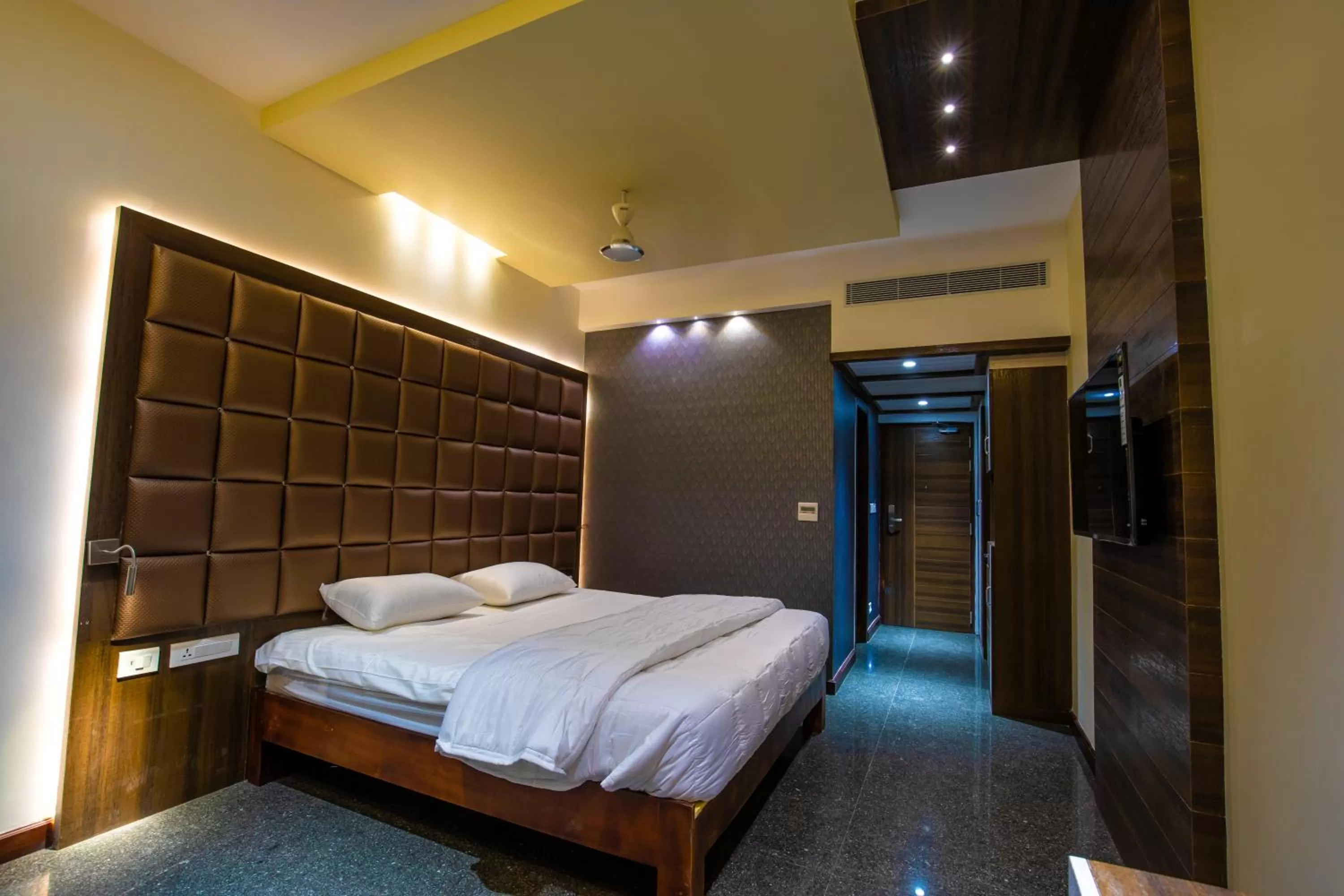 Bed in HOTEL VIJAYARANI