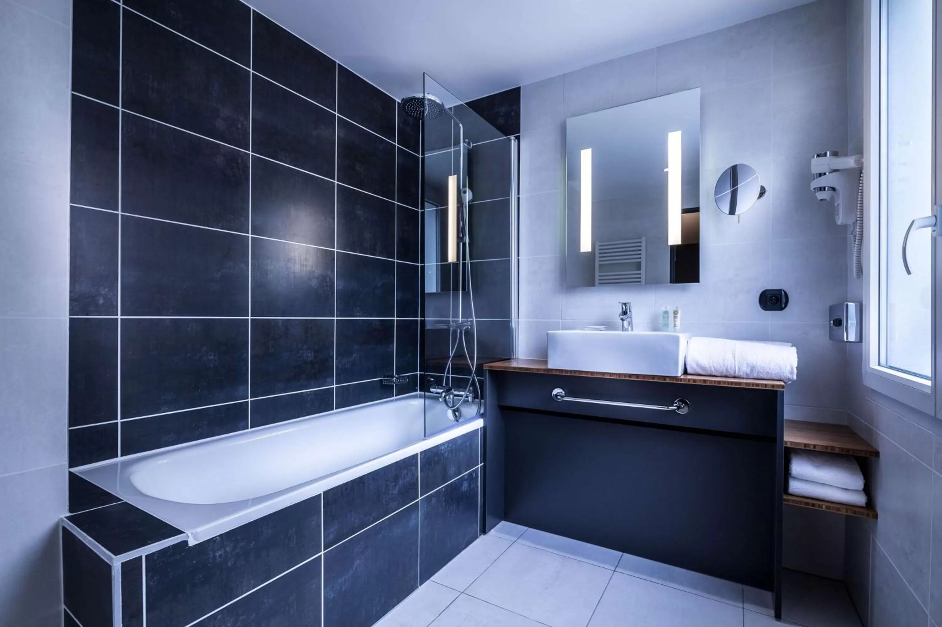 Bathroom in Best Western Plus Suitcase Paris La Défense