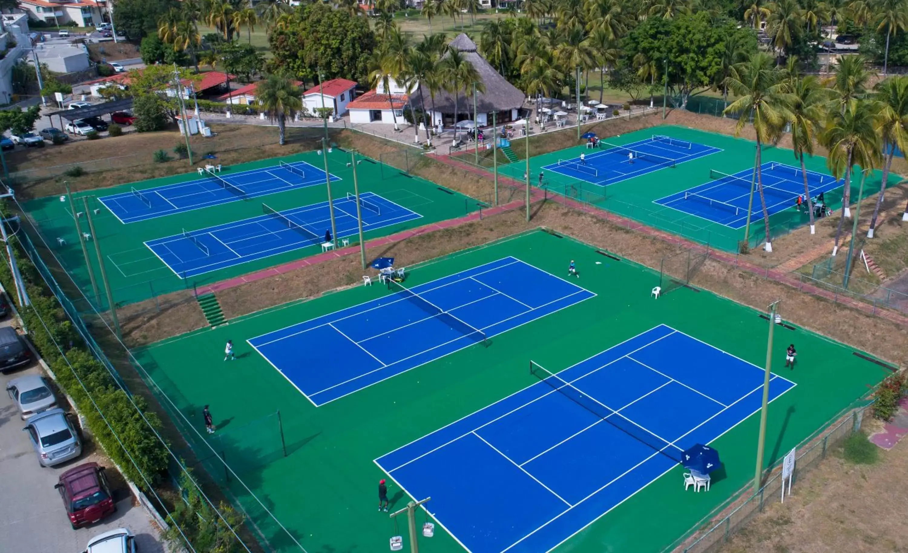 Tennis court, Pool View in Las Hadas by Brisas