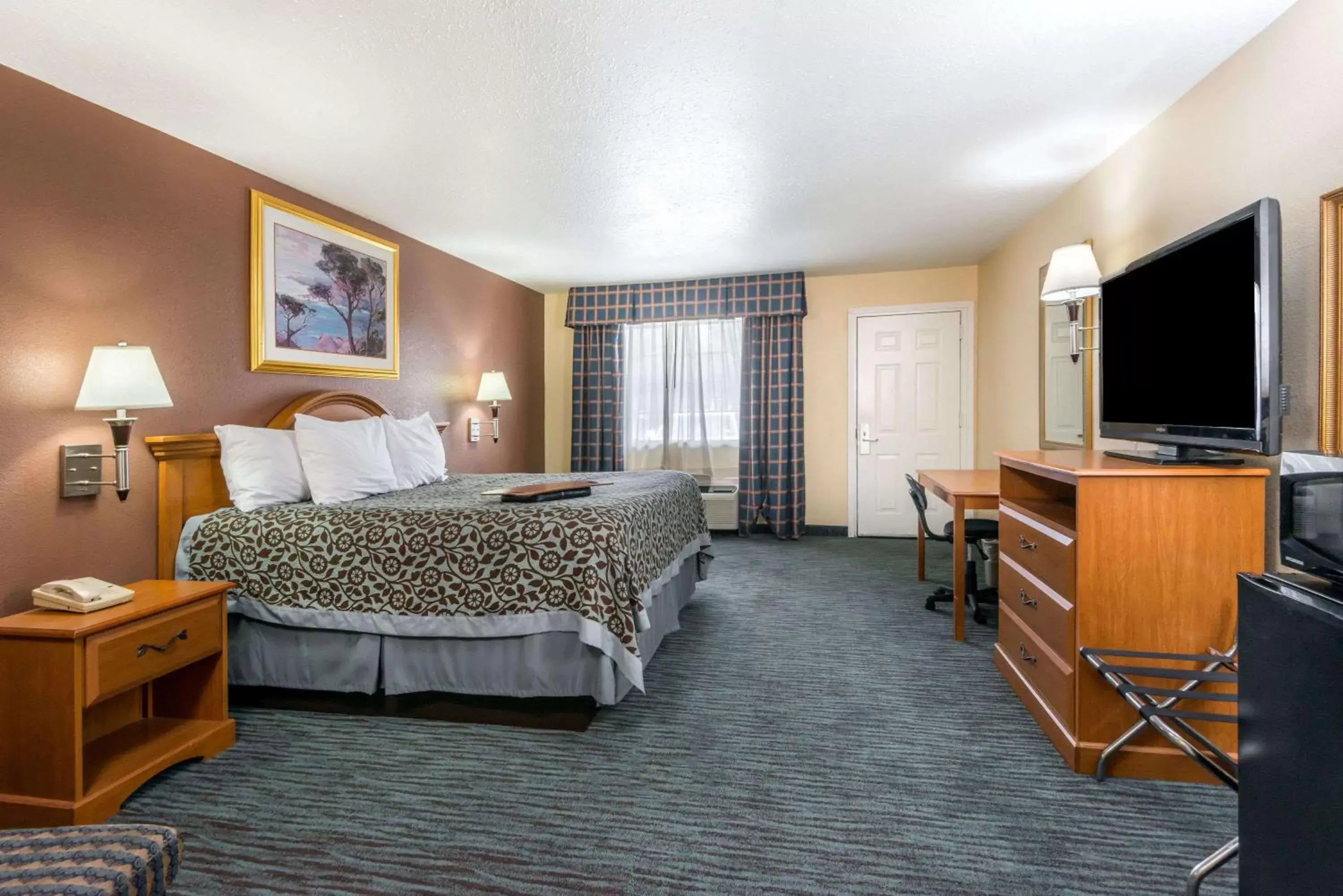 Photo of the whole room, TV/Entertainment Center in Days Inn by Wyndham New Braunfels
