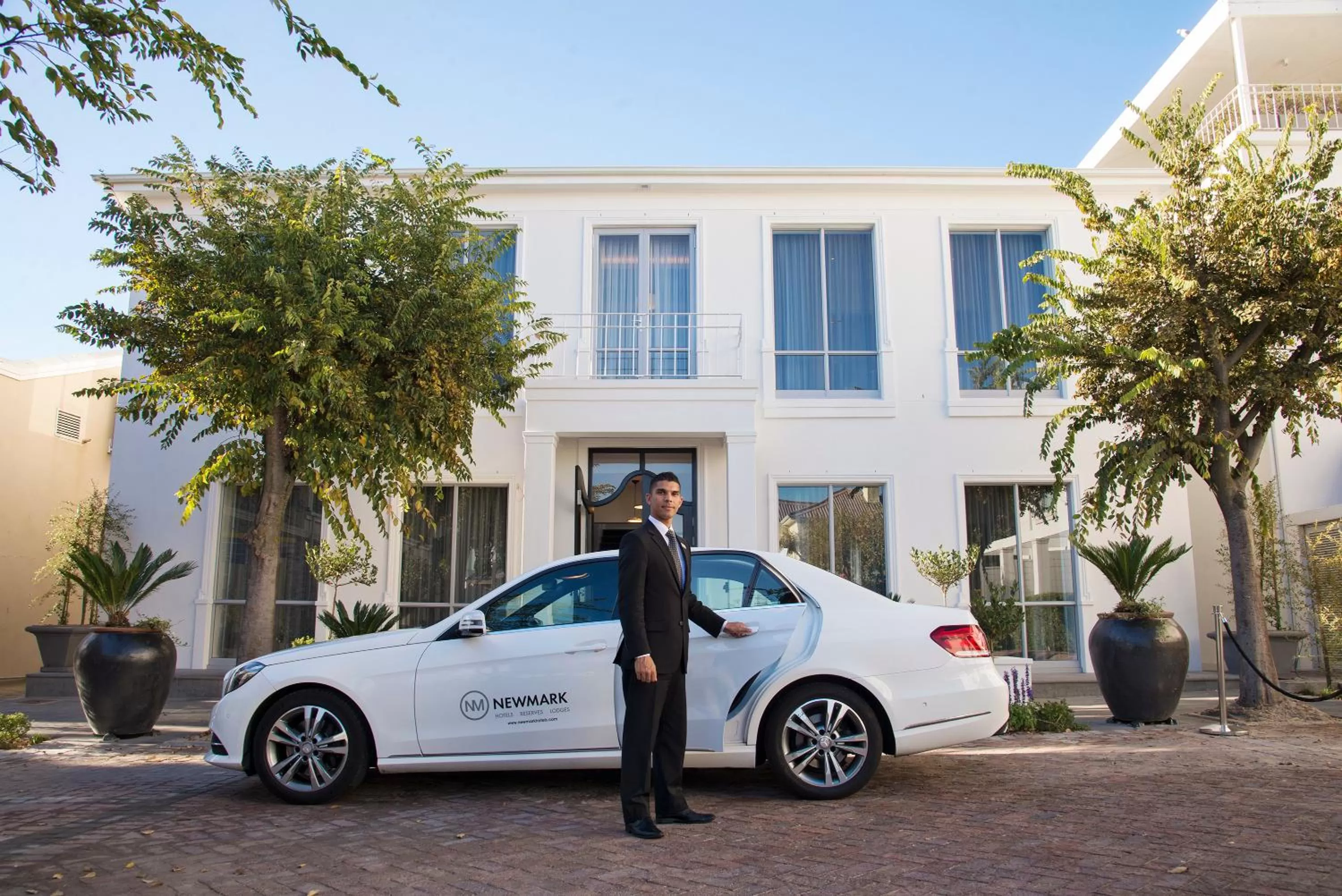 Facade/entrance in The Manor House at the Queen Victoria Hotel by NEWMARK