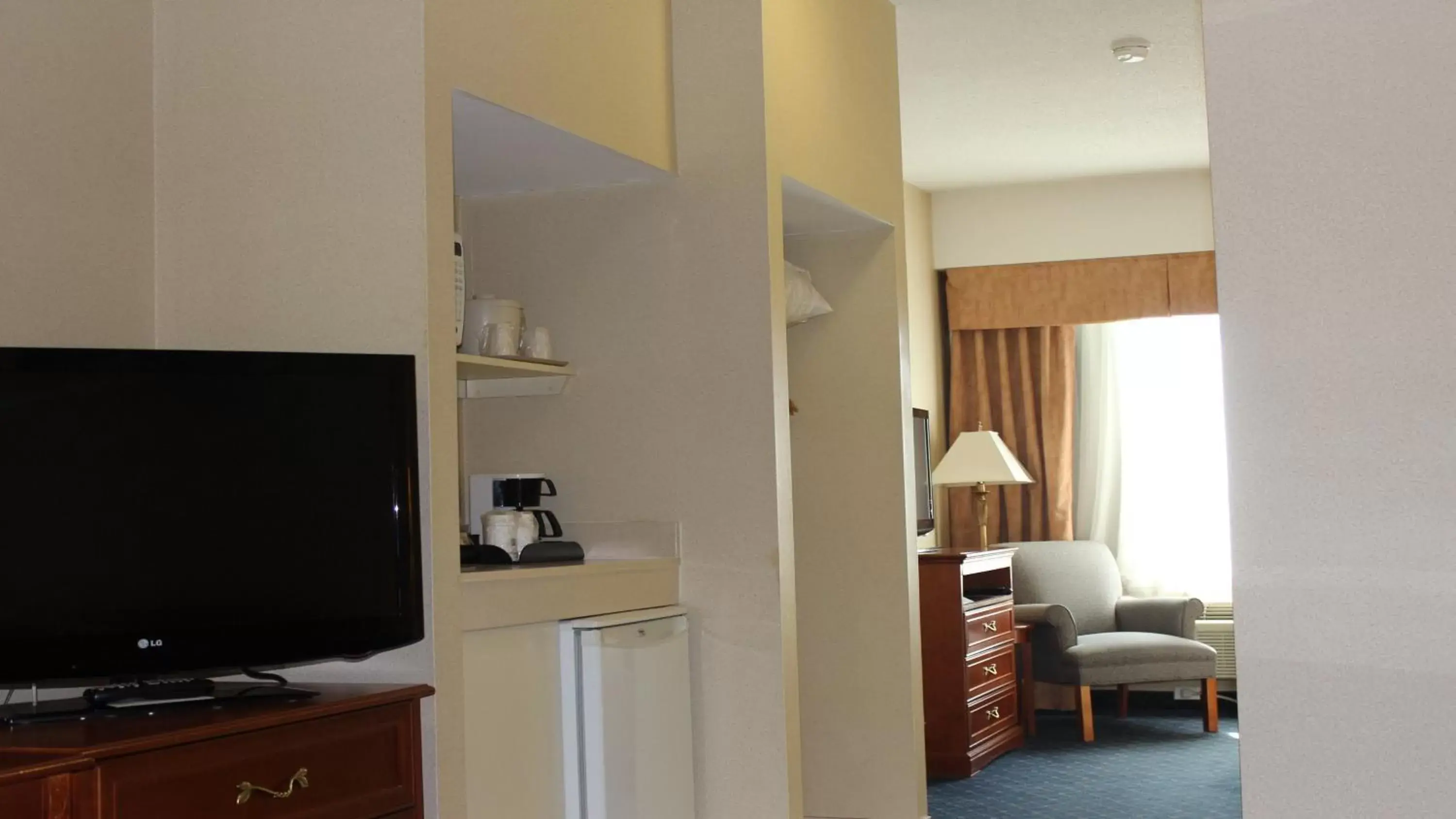 Photo of the whole room, TV/Entertainment Center in Holiday Inn Express Hotel & Suites Barrie, an IHG Hotel