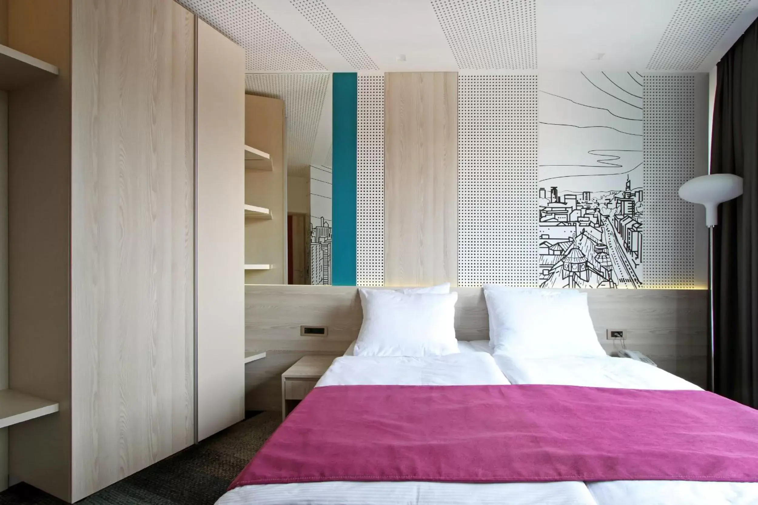 Bed in Hotel Cosmopolit
