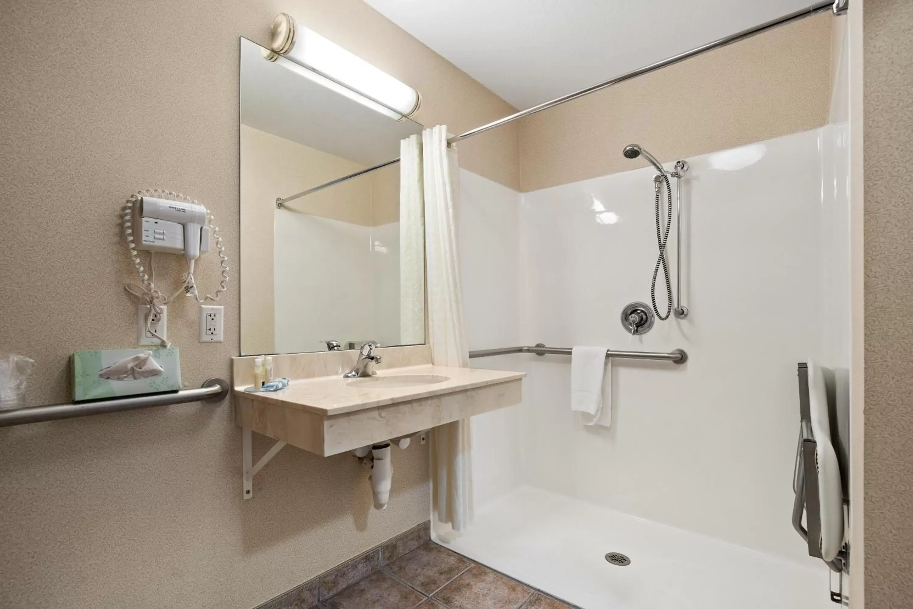 Bathroom in Stay USA Hotel and Suites