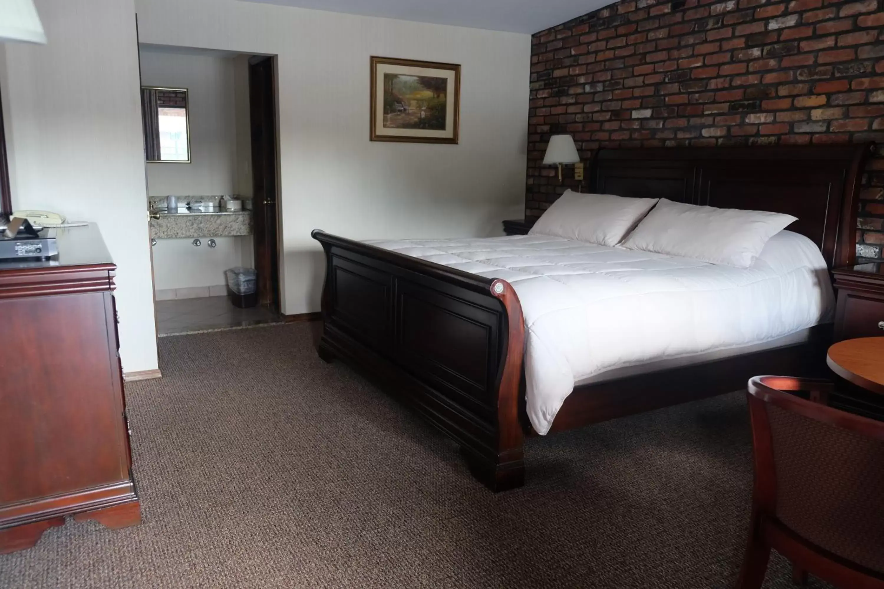 Bed in Chalet Inn & Suites