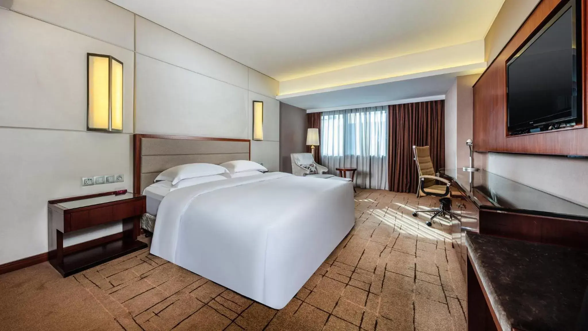 Photo of the whole room in Crowne Plaza Foshan, an IHG Hotel - Exclusive bus stations for HKSAR round-trips