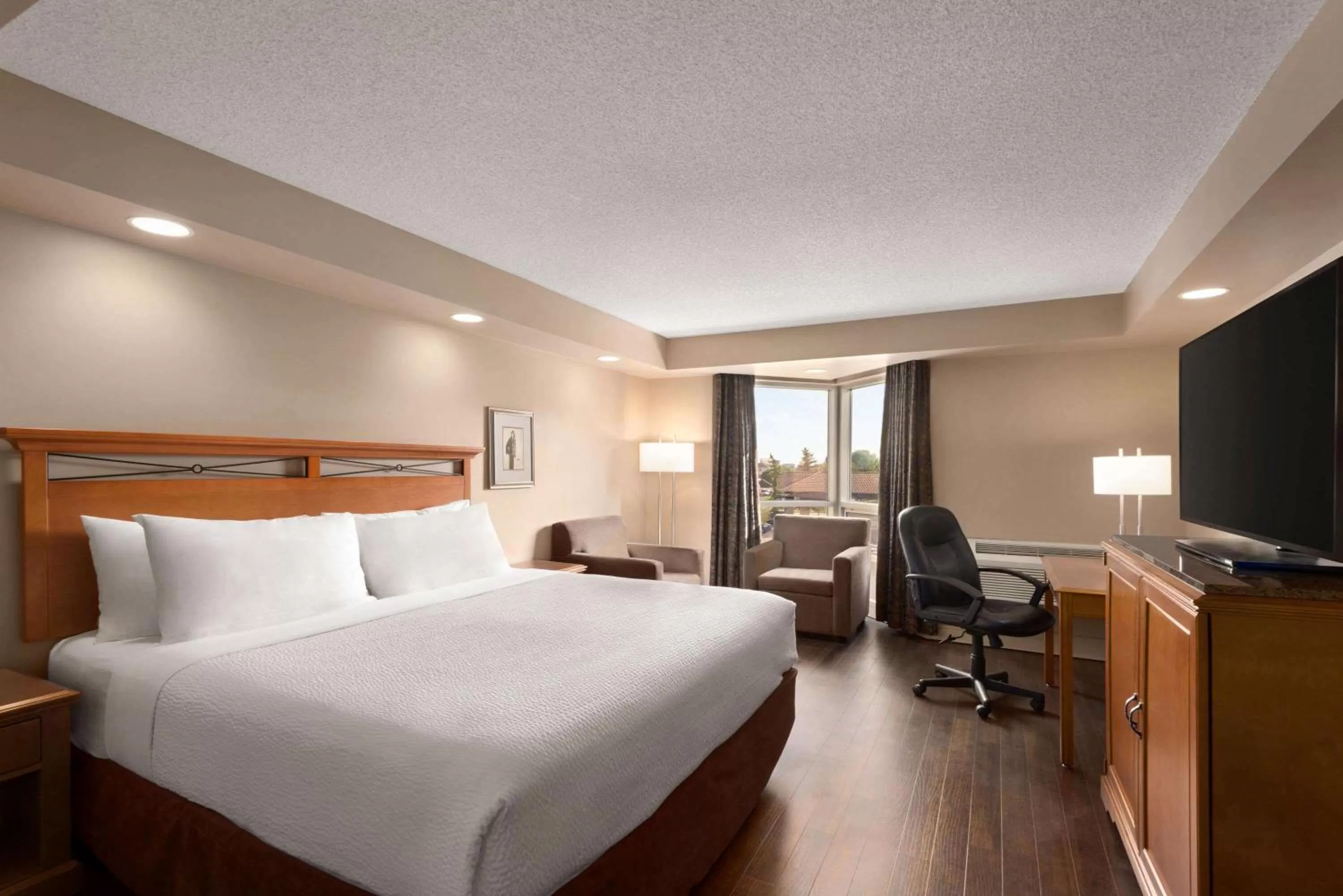 Photo of the whole room, Bed in Royal Hotel West Edmonton, Trademark Collection by Wyndham