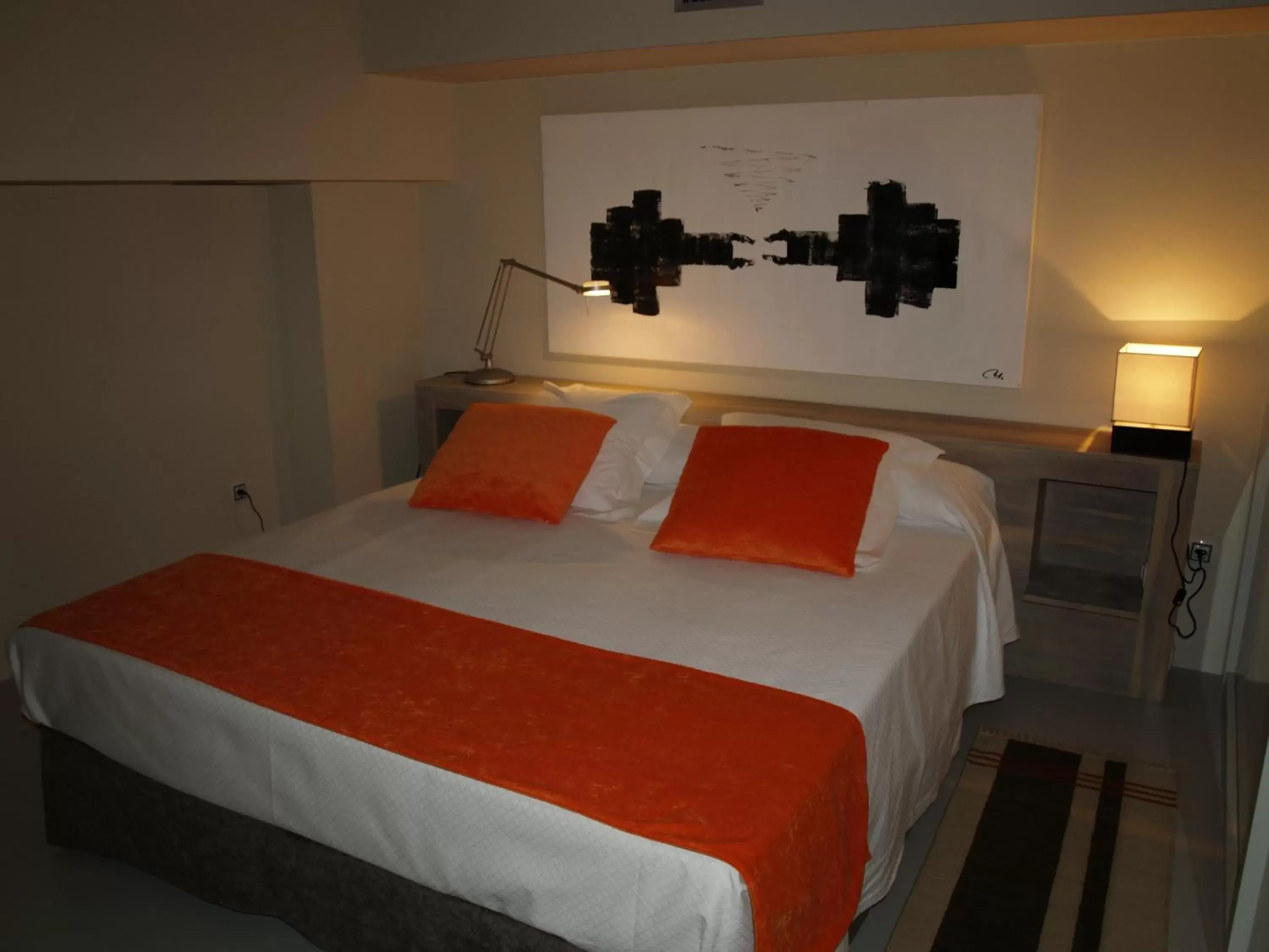 Bed in Eco Alcalá Suites