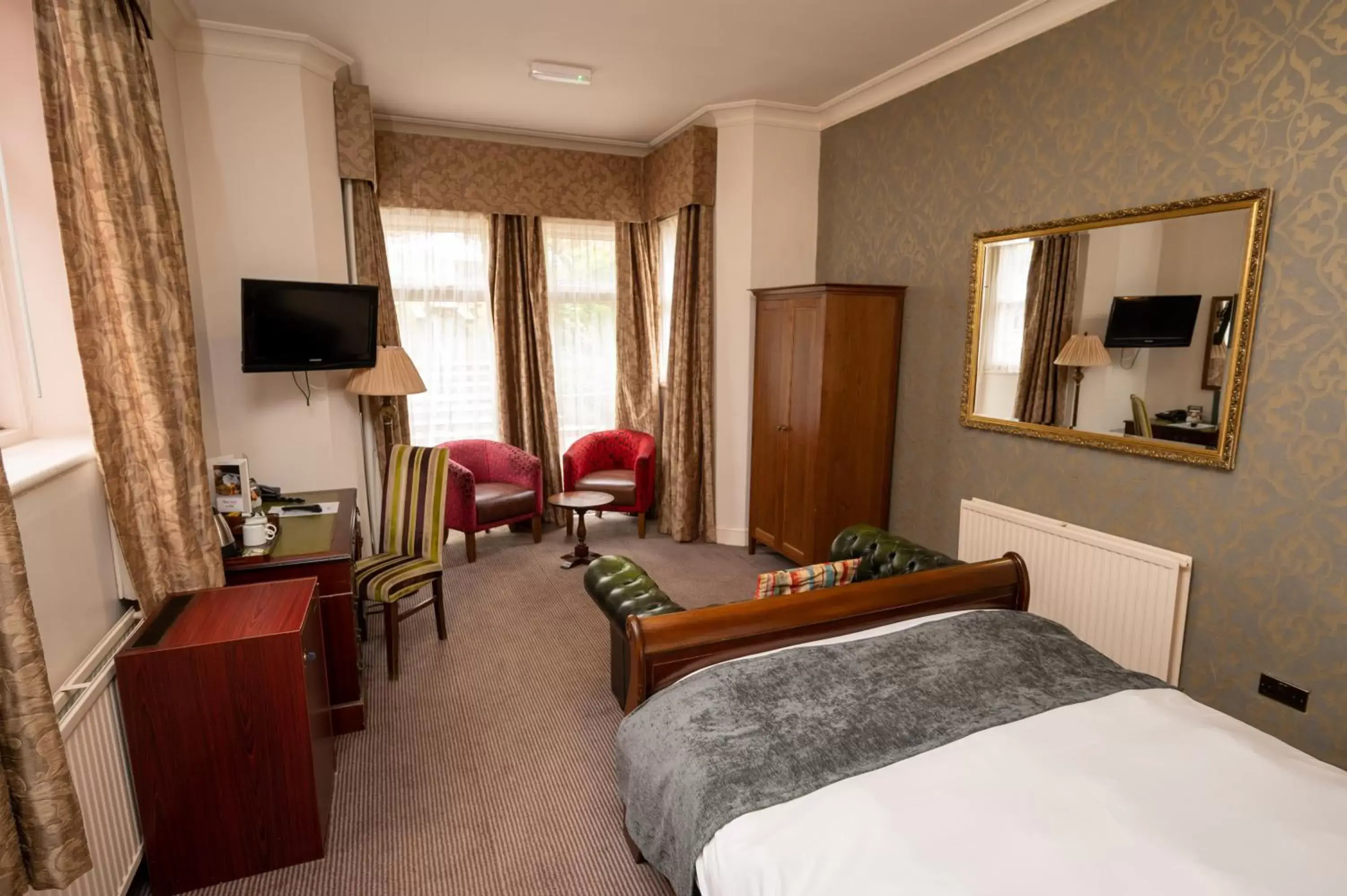 Bedroom, Seating Area in Castle and Ball by Greene King Inns