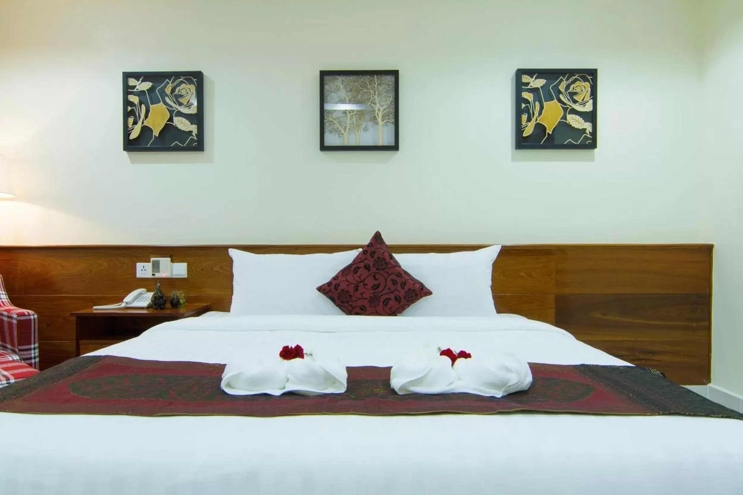 Bed in Rose Emerald Hotel