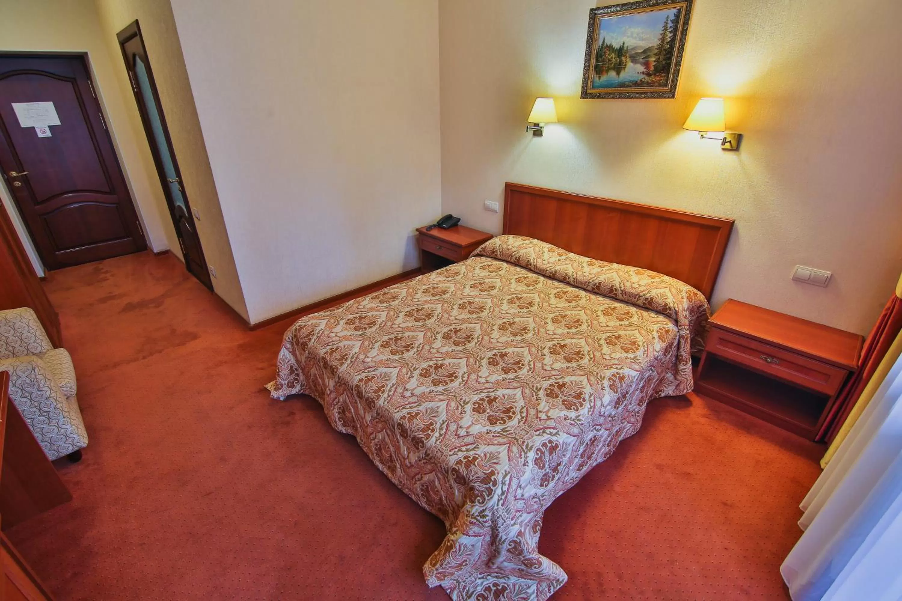 Bed in Ukraina Hotel