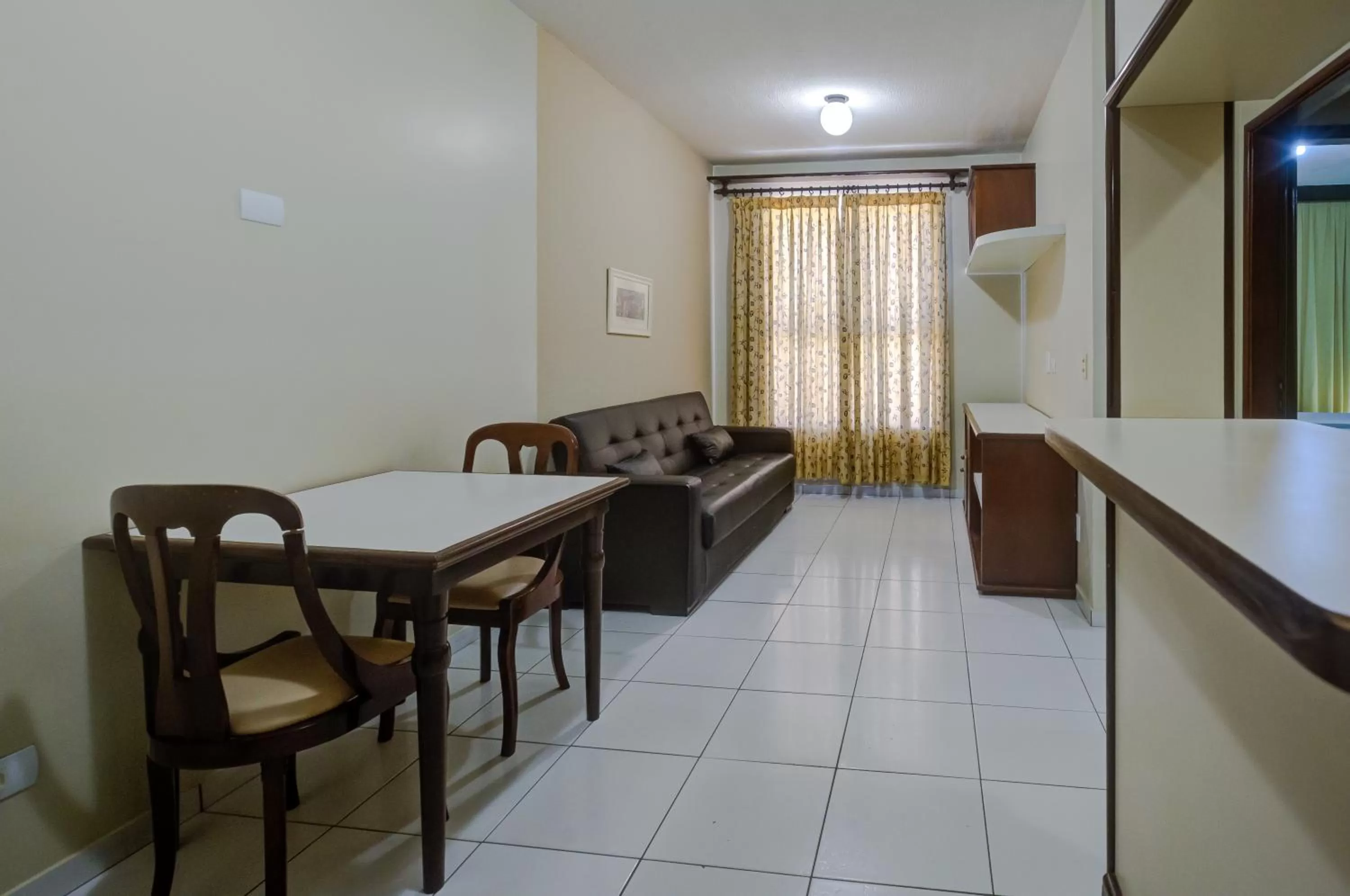 Living room in Slaviero Londrina Flat