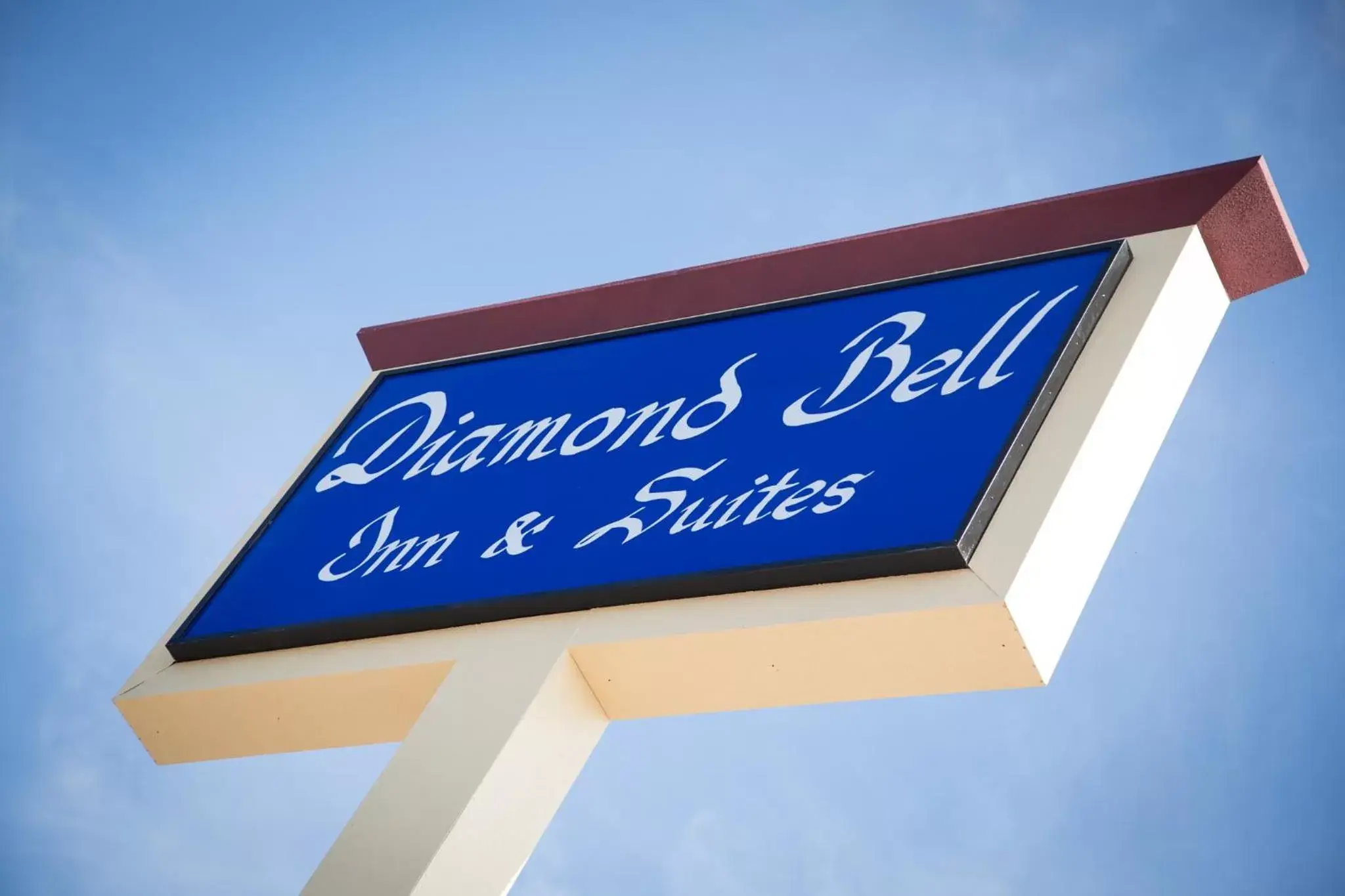 Property logo or sign in Diamond Bell Inn & Suites