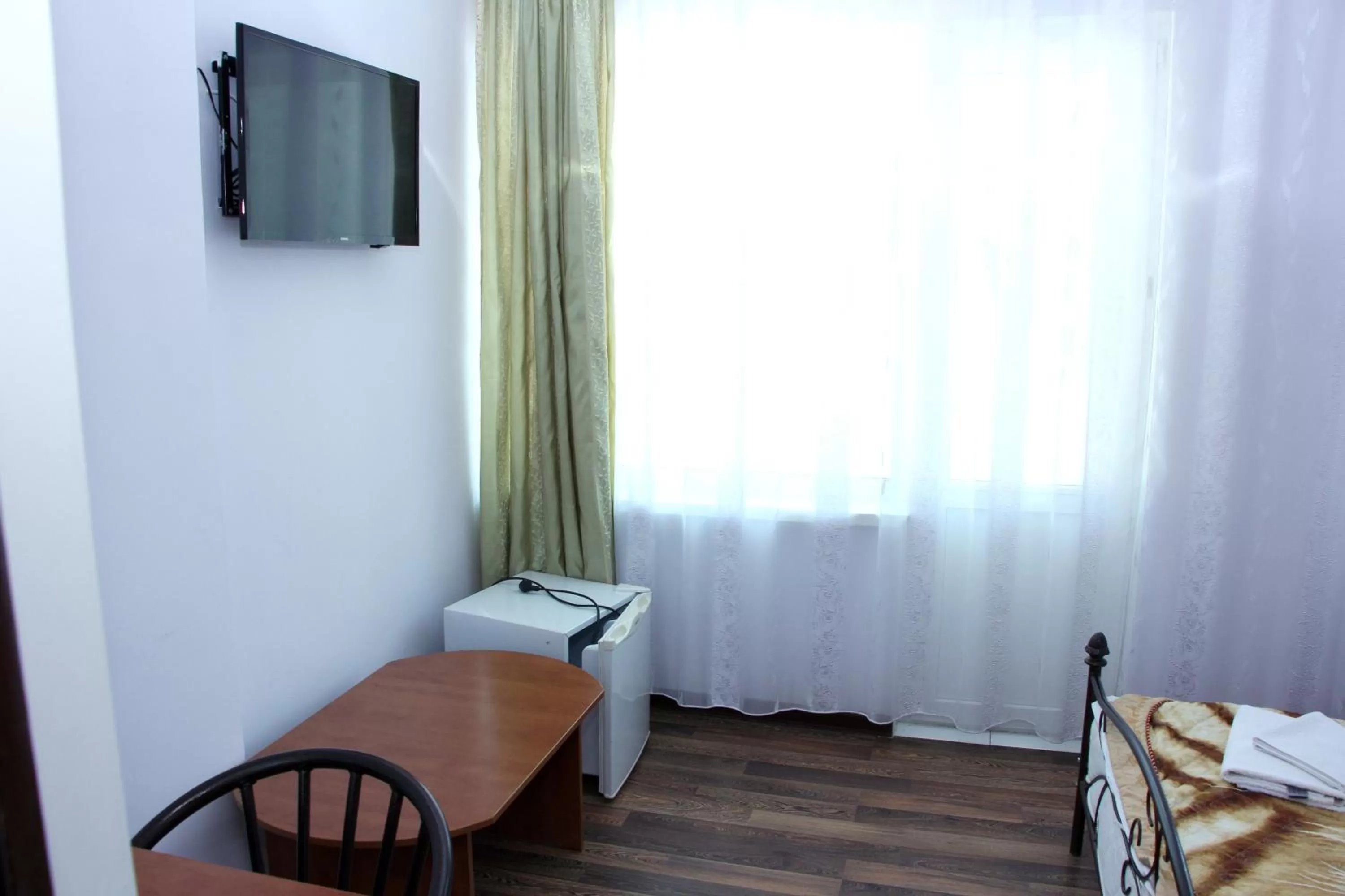 Bed in Zhaylau Hotel