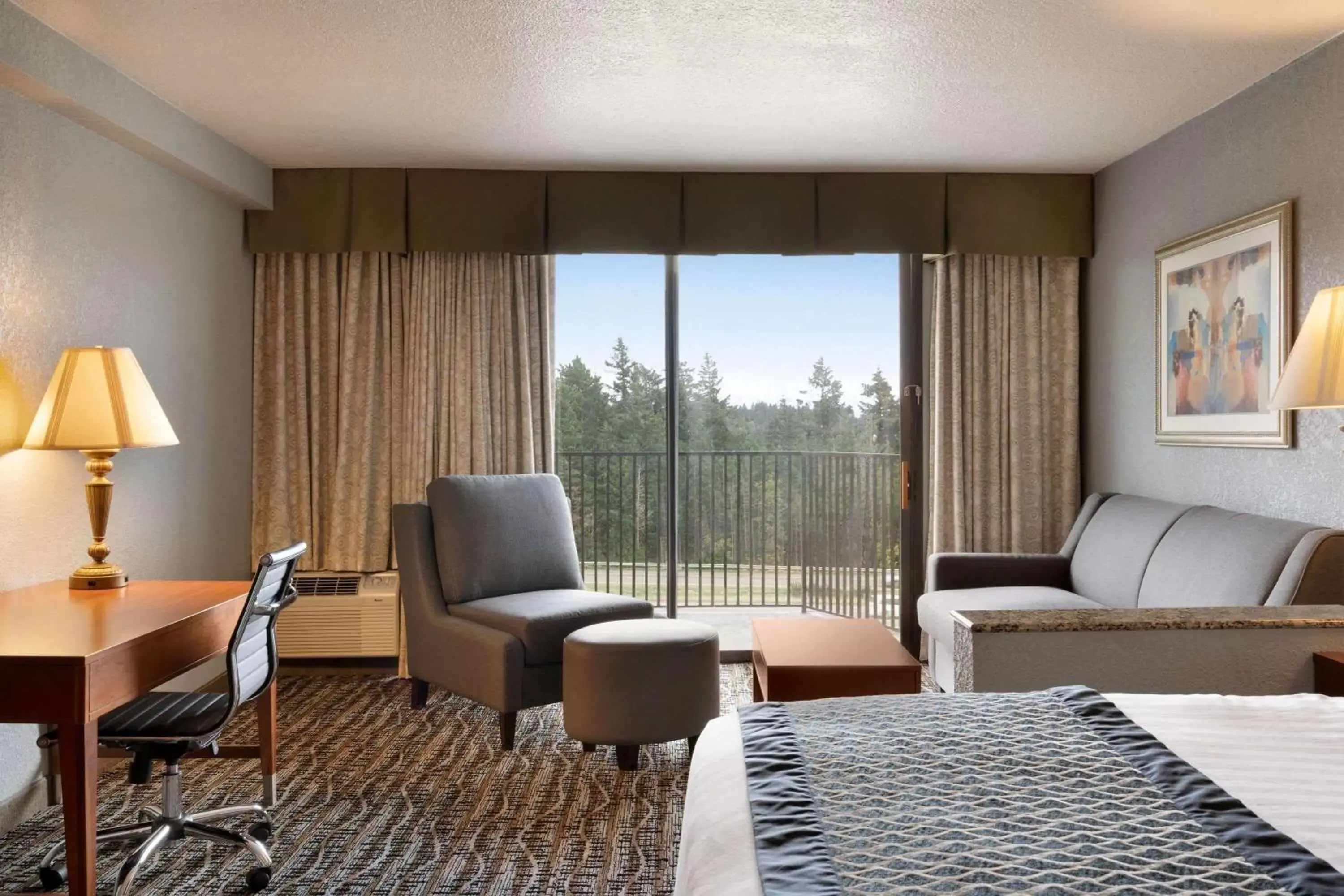 Photo of the whole room, Seating Area in Baymont by Wyndham Bremerton WA