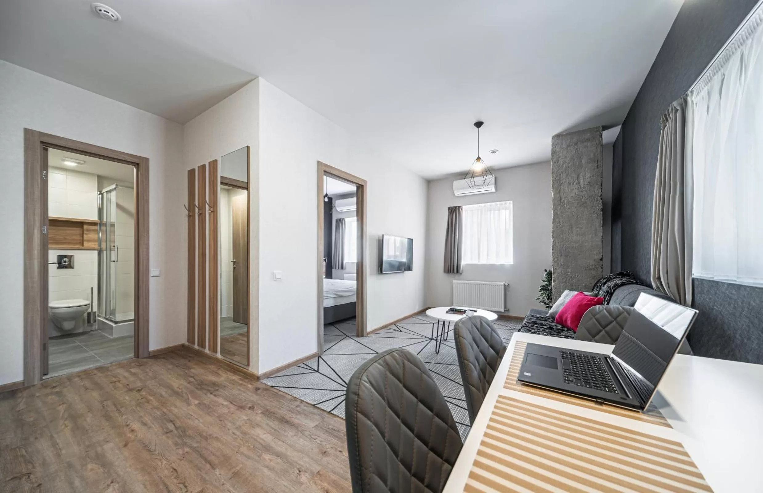 Communal lounge/ TV room in Amarant Urban Hotel by CHM