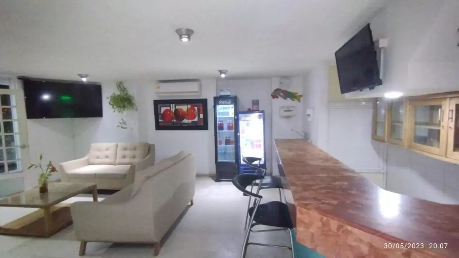 Lounge or bar, Seating Area in Coral Reef Hotel