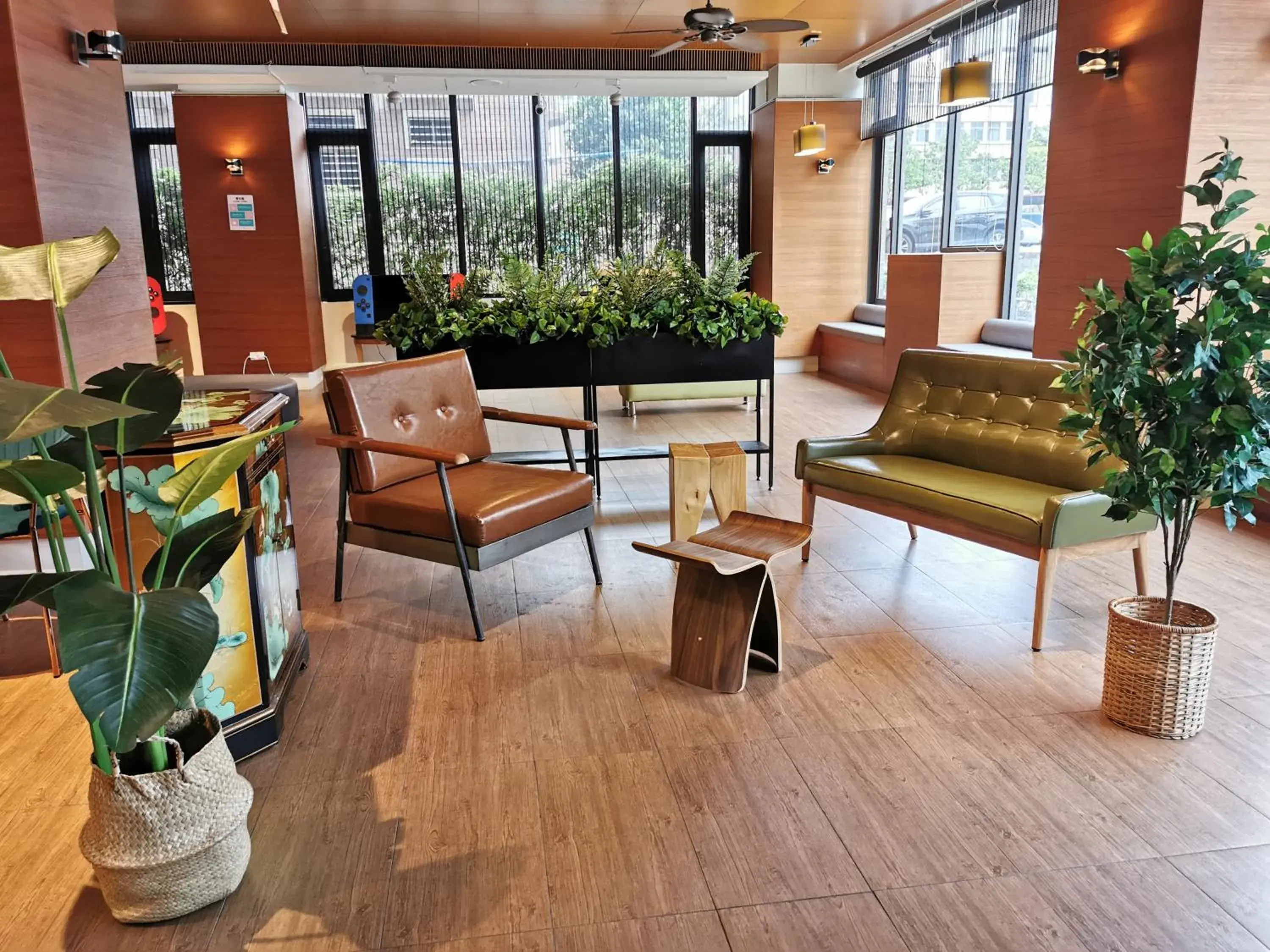 Communal lounge/ TV room in Azure Hotel