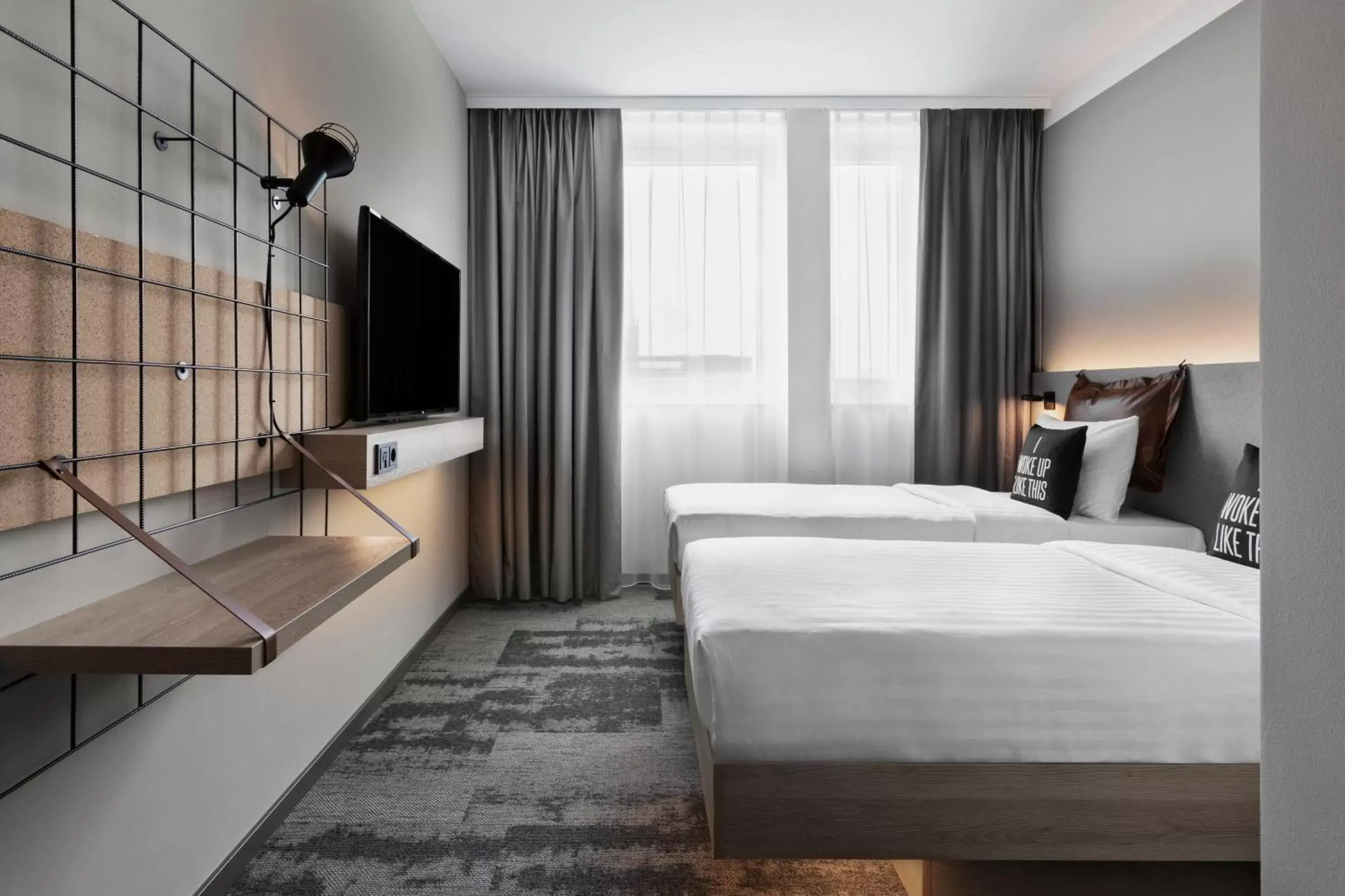 Photo of the whole room, Bed in Moxy Duesseldorf City