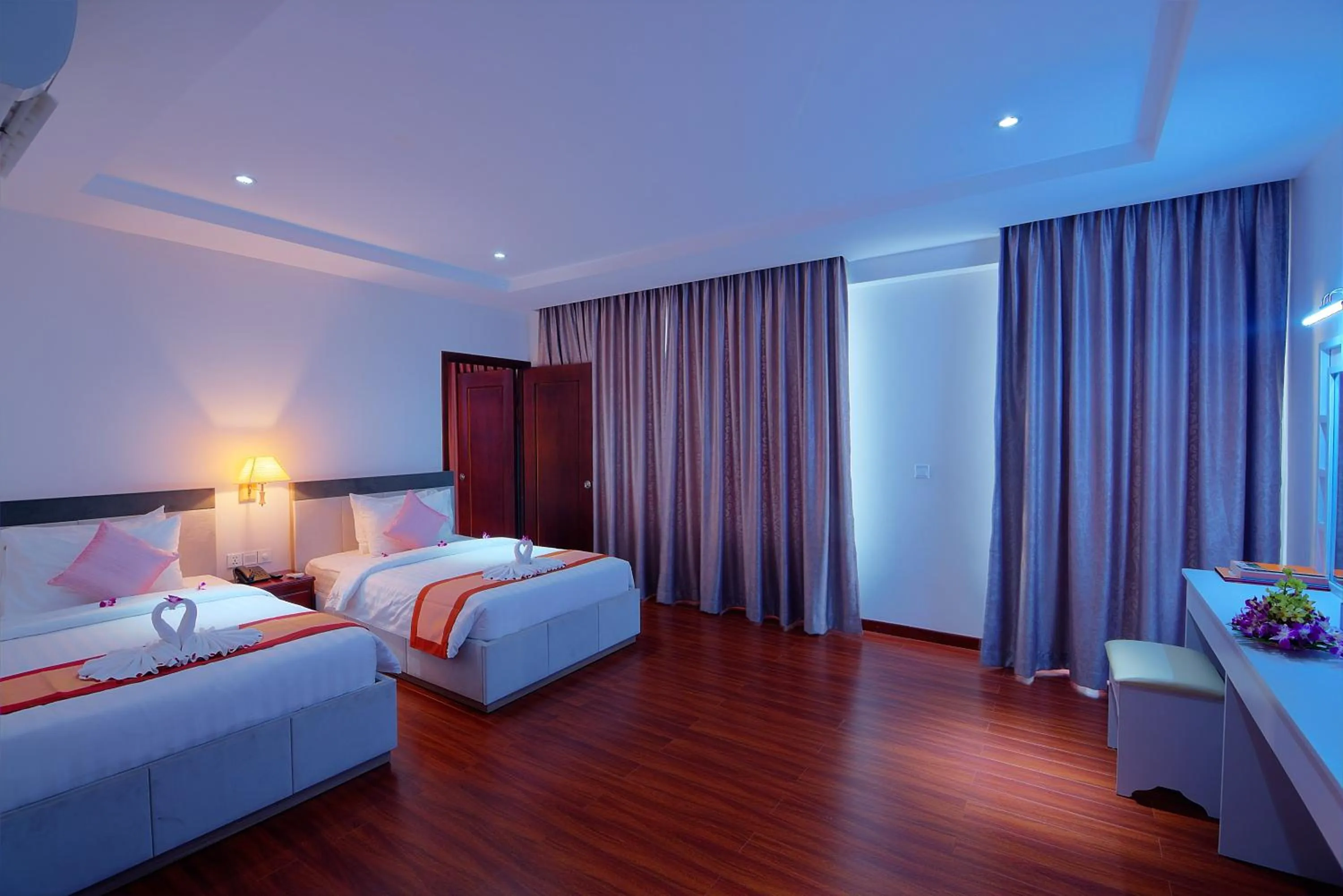 Photo of the whole room, Bed in Starry Angkor Hotel