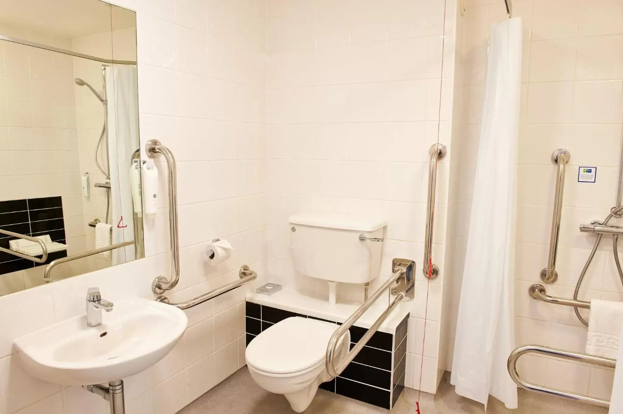 Photo of the whole room, Bathroom in Holiday Inn Express Manchester Airport, an IHG Hotel