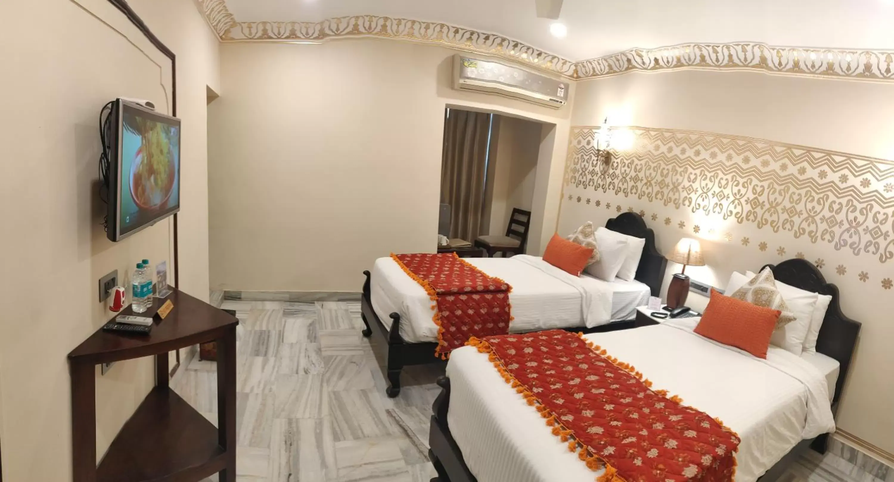 Bed in Laxmi Palace Heritage Boutique Hotel