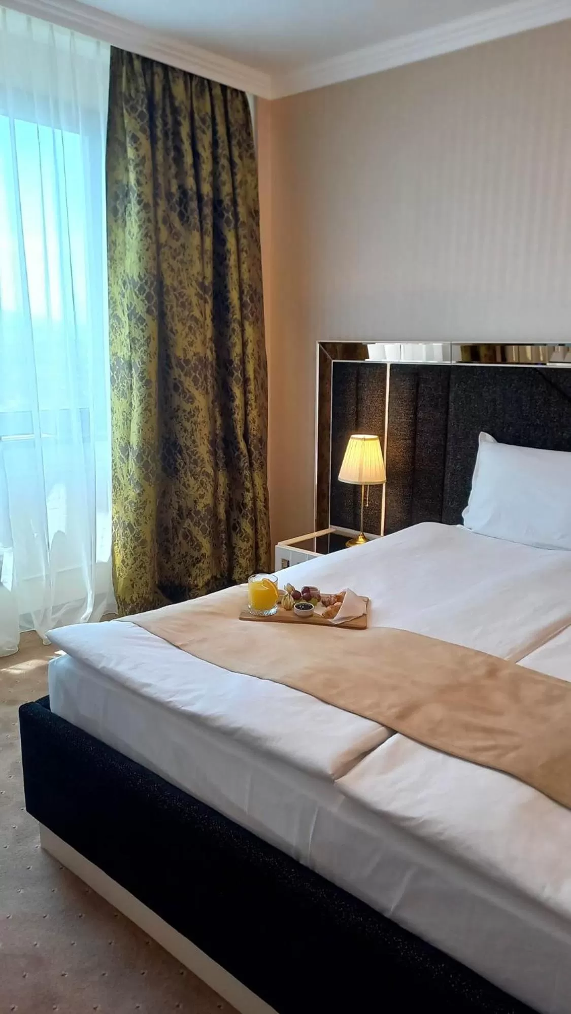 Bed in Astoria Grand Hotel