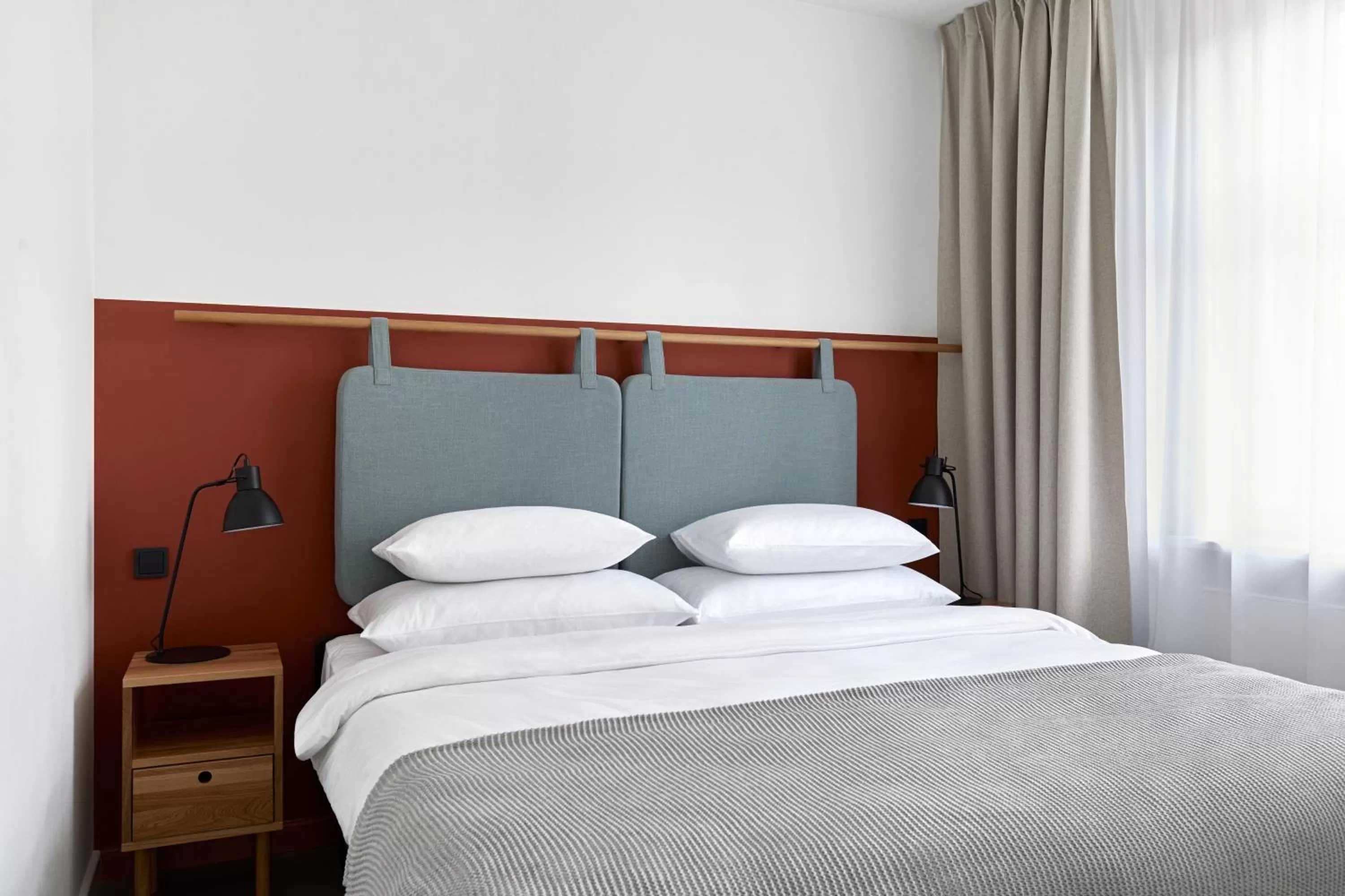 Bed in PLANTONIA Aparthotel