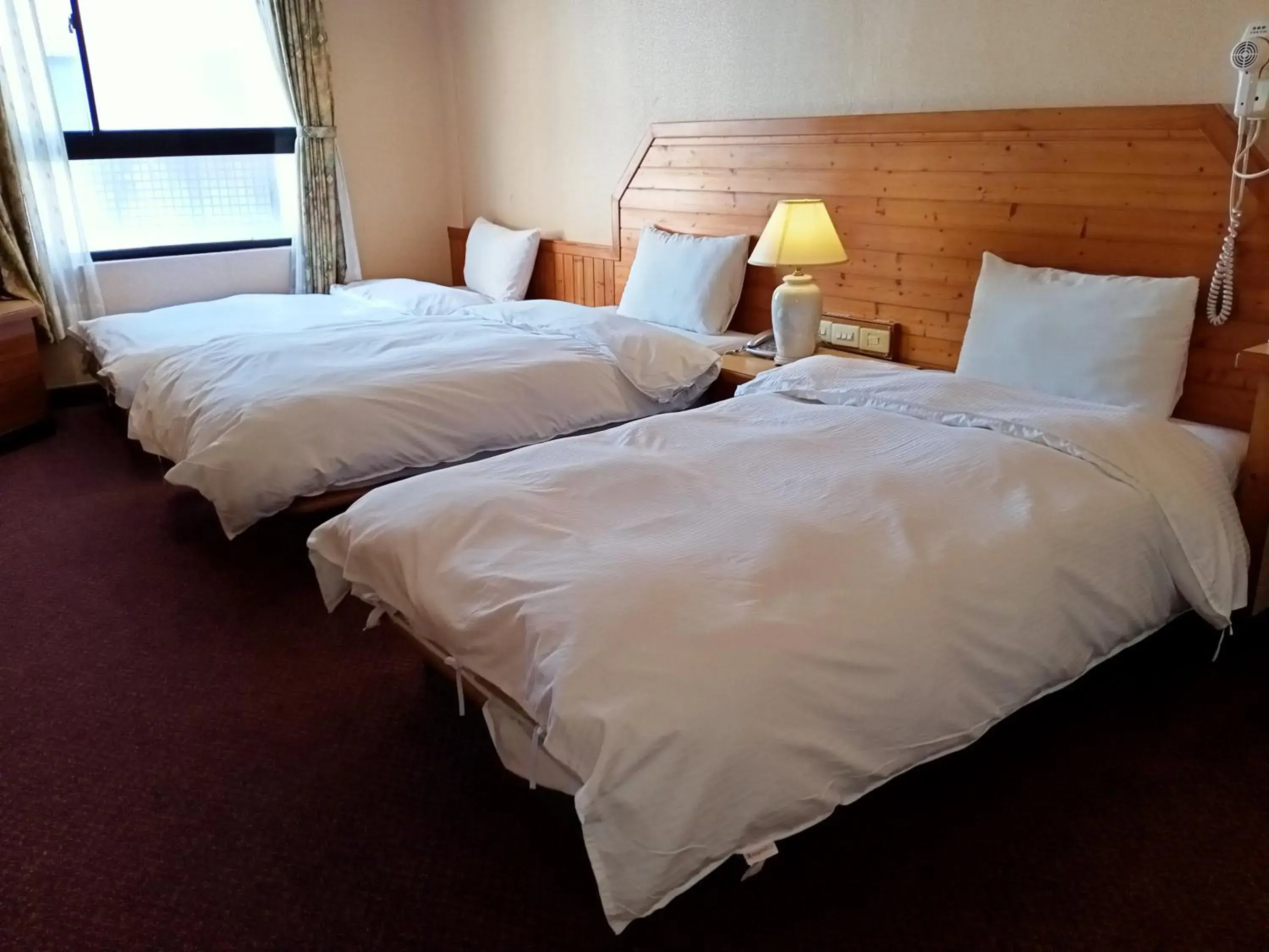 Bed in Chungli Business Hotel