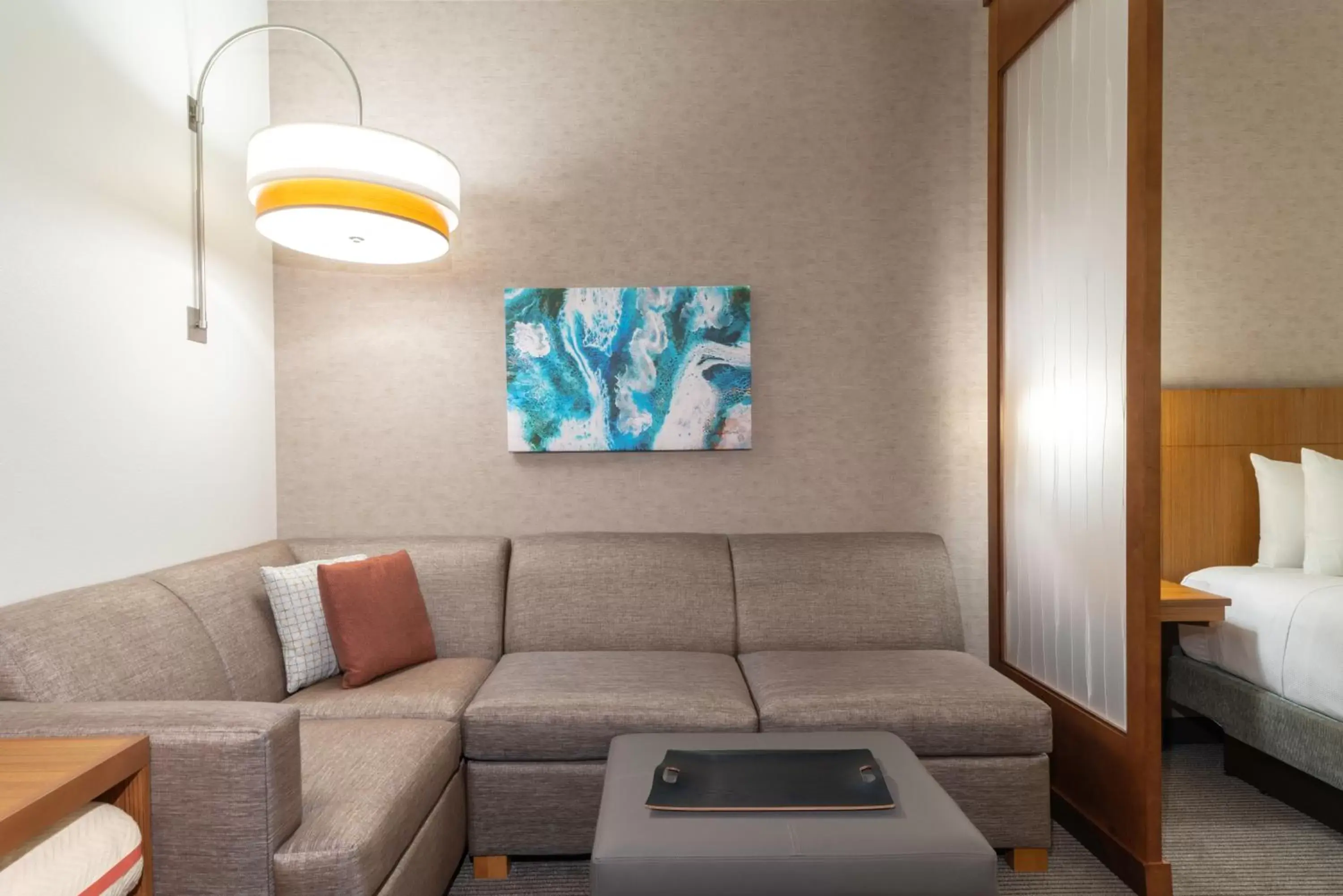 Living room, Bed in Hyatt Place Sandestin at Grand Blvd Living room, Bed in Hyatt Place Sandestin at Grand Blvd