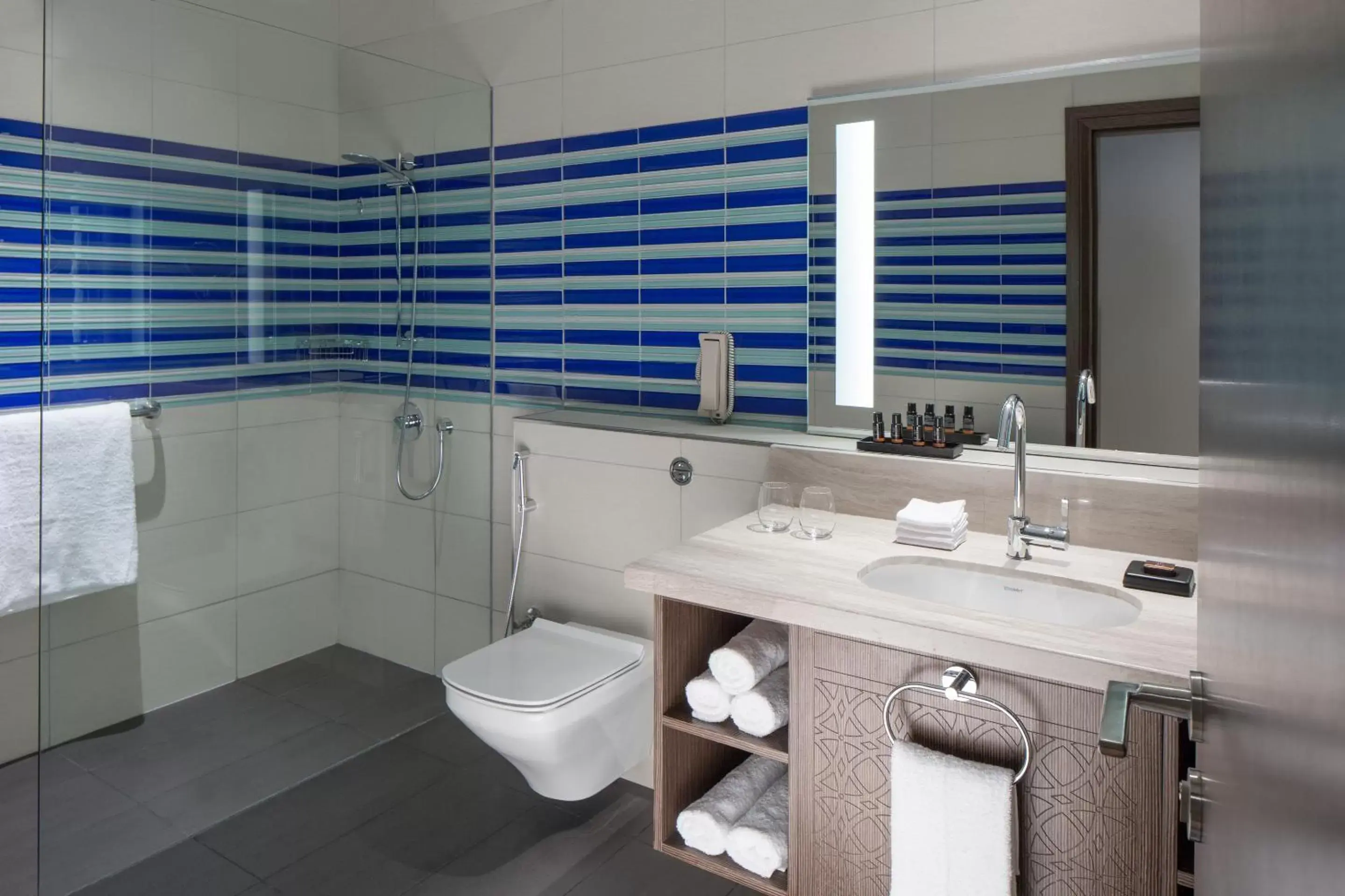 Bathroom in Dusit D2 Kenz Hotel Dubai