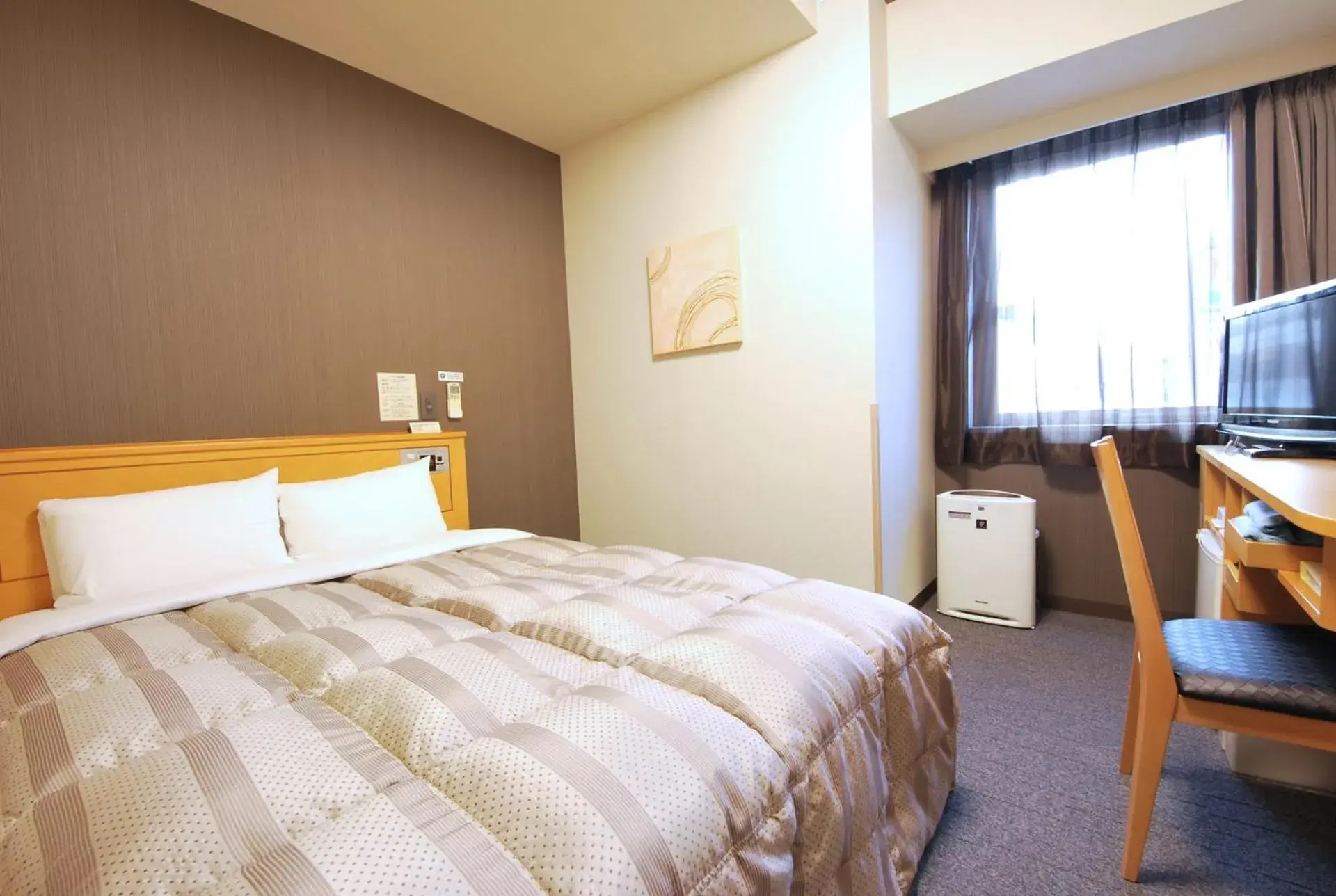 Bed in Hotel Route Inn Morioka Ekimae