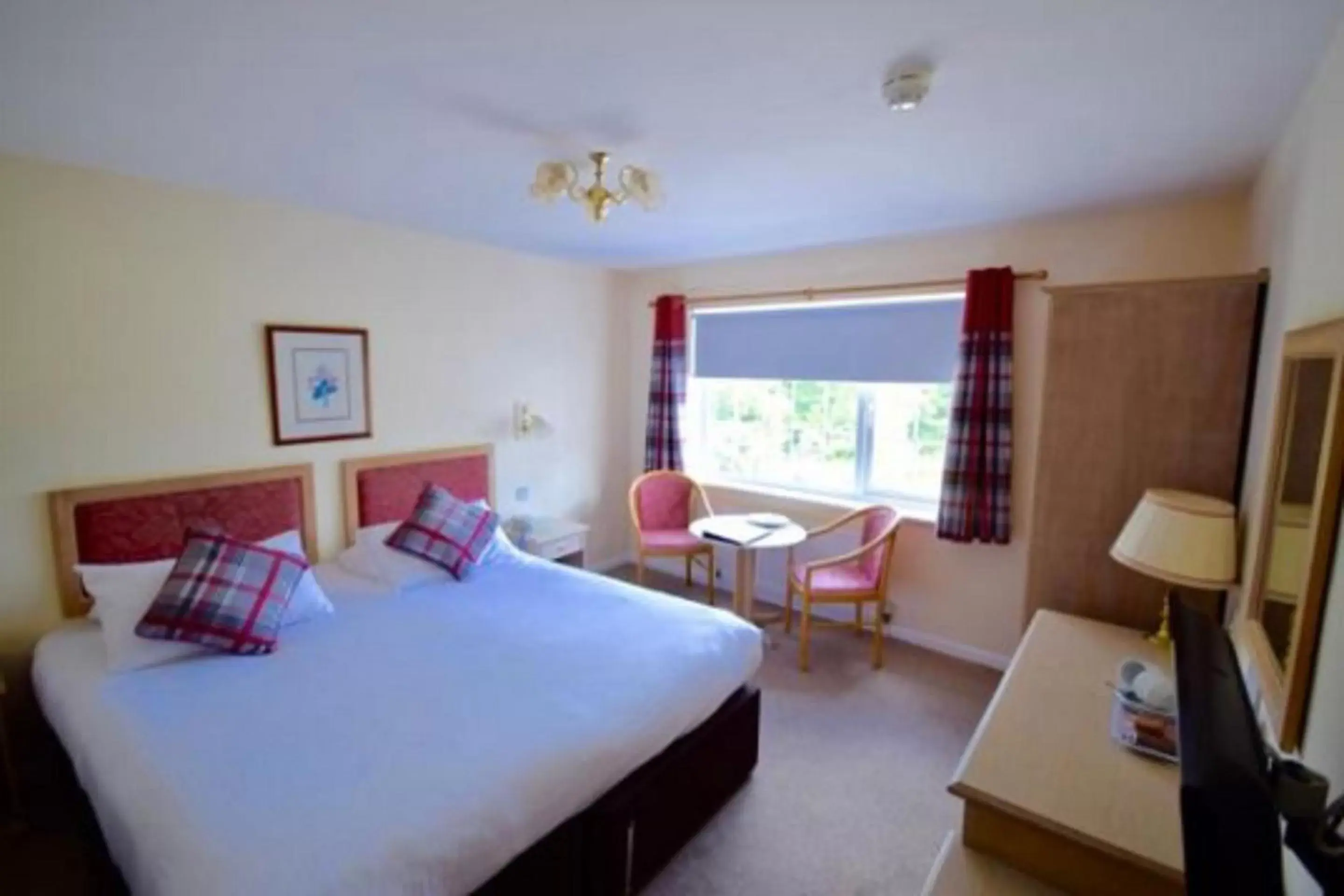Bedroom in Penmere Manor Hotel