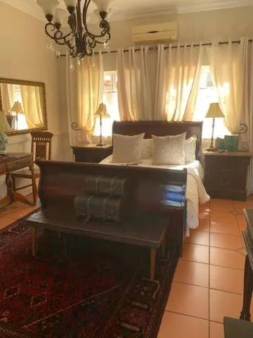 Bed in A Tapestry Garden Guest House