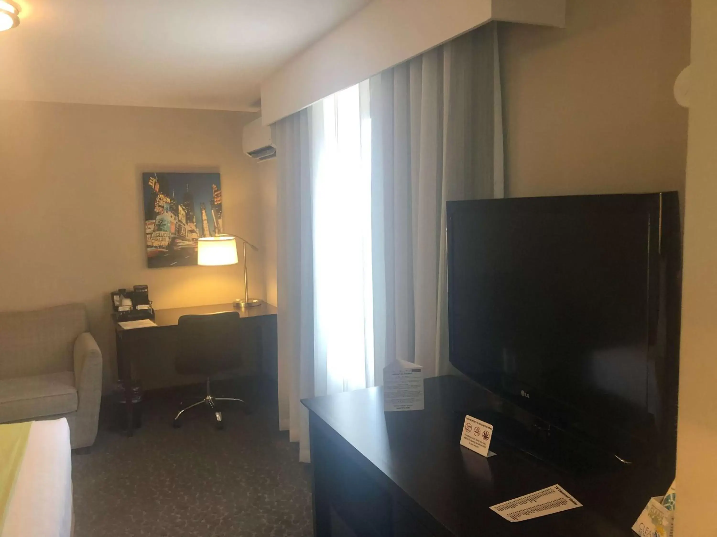 Photo of the whole room, TV/Entertainment Center in Best Western Fort Lee