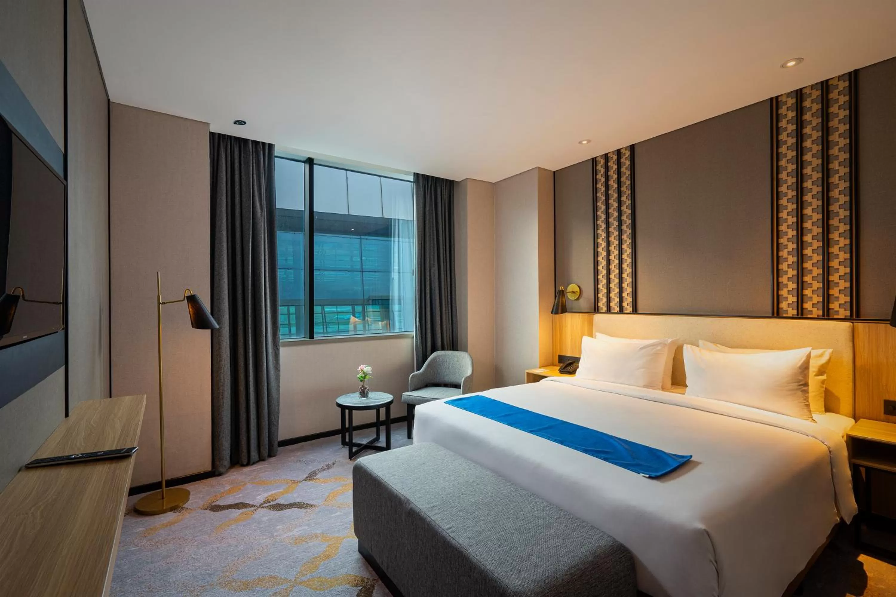 Bed in Anara Airport Hotel