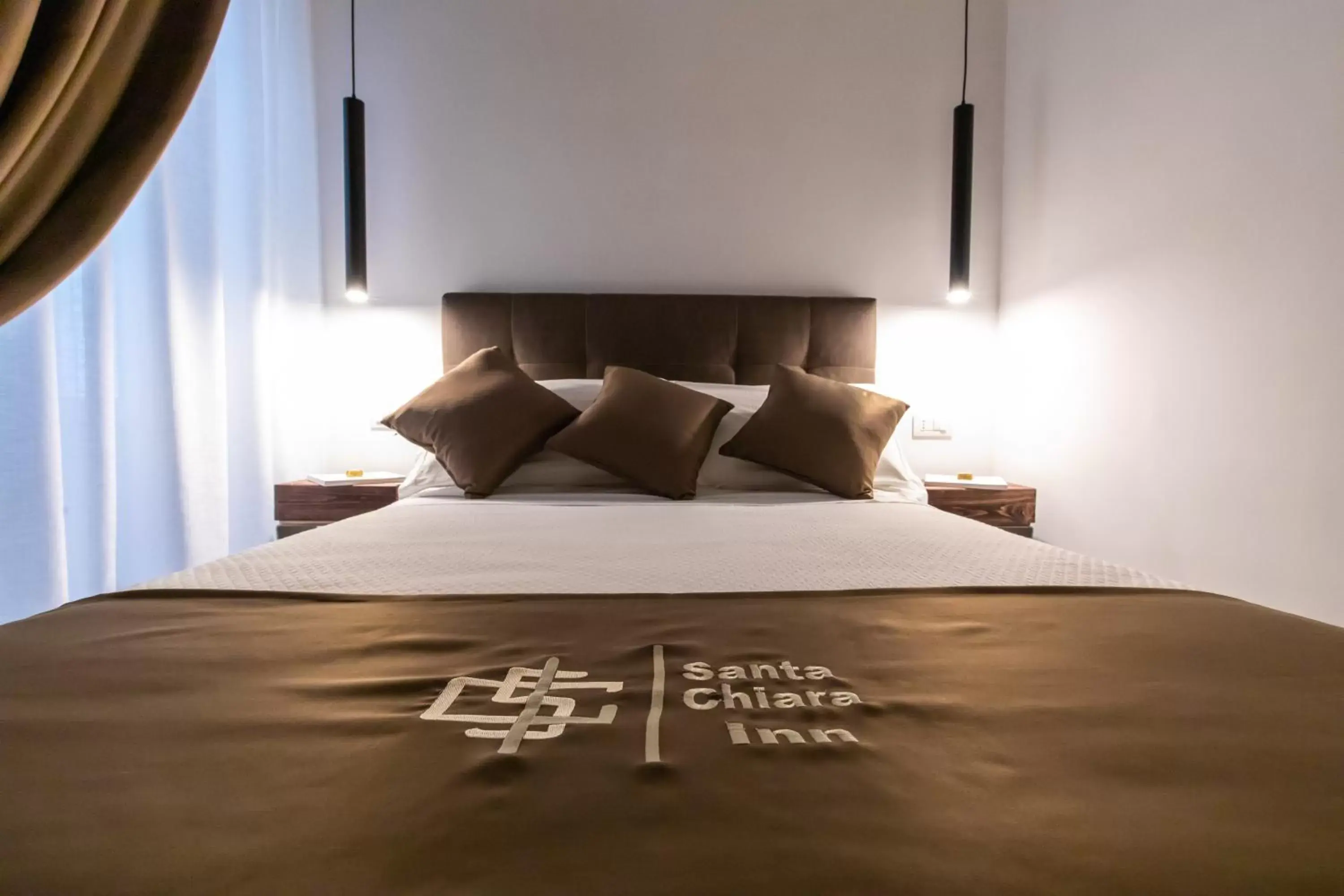 Bed in Santa Chiara Inn