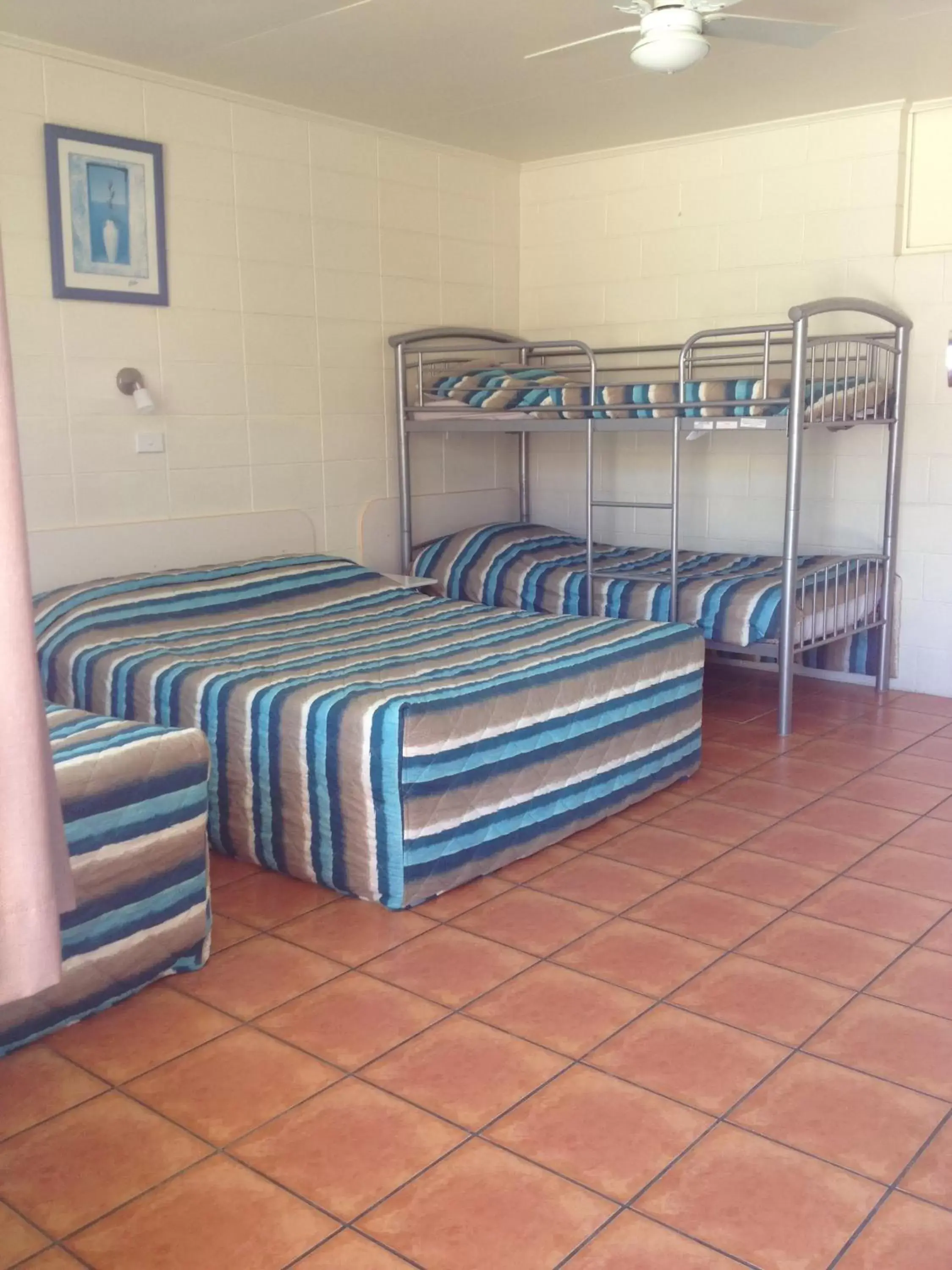 Bed in Sunburst Motel