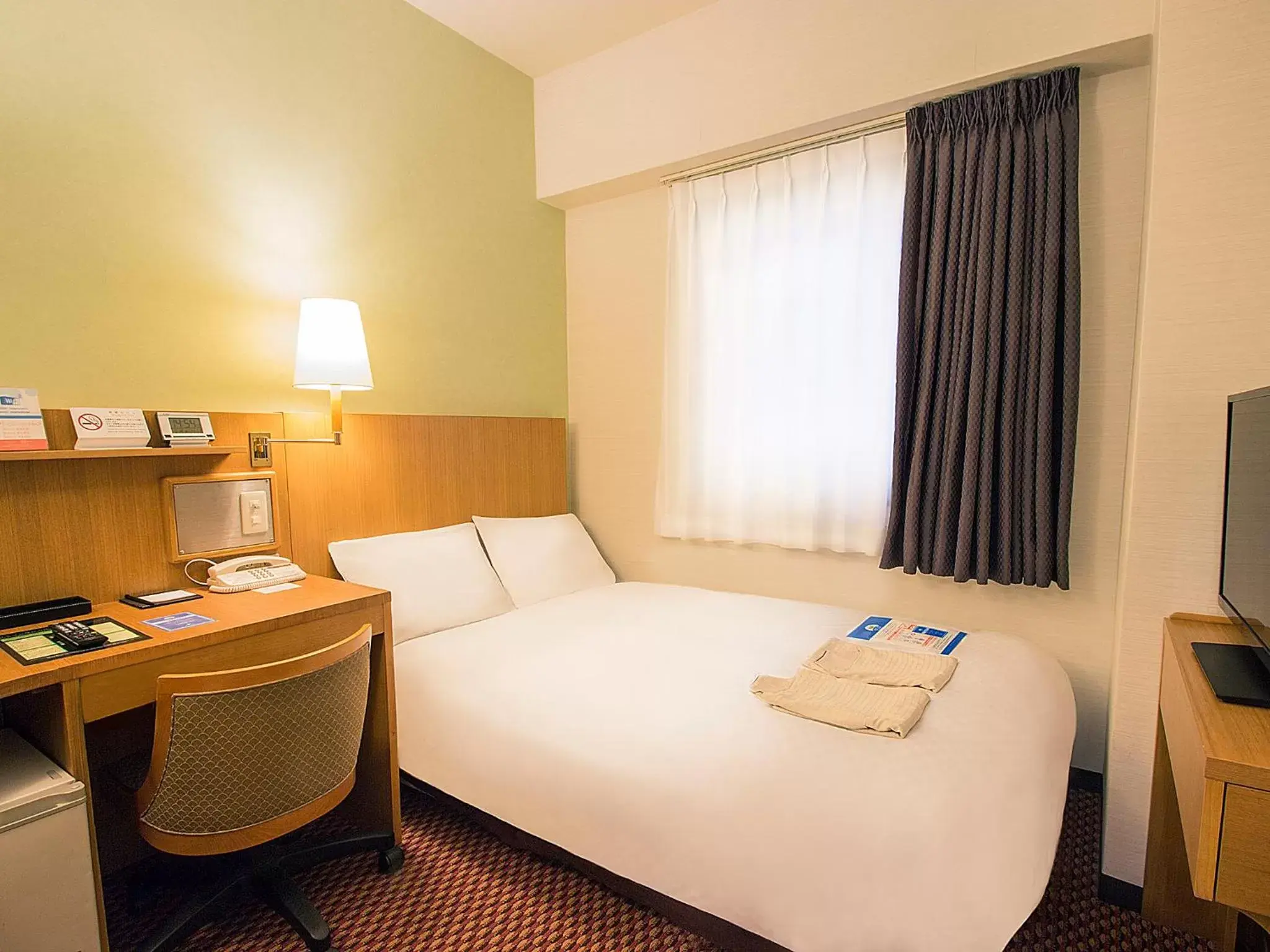 Photo of the whole room, Bed in Hearton Hotel Shinsaibashi