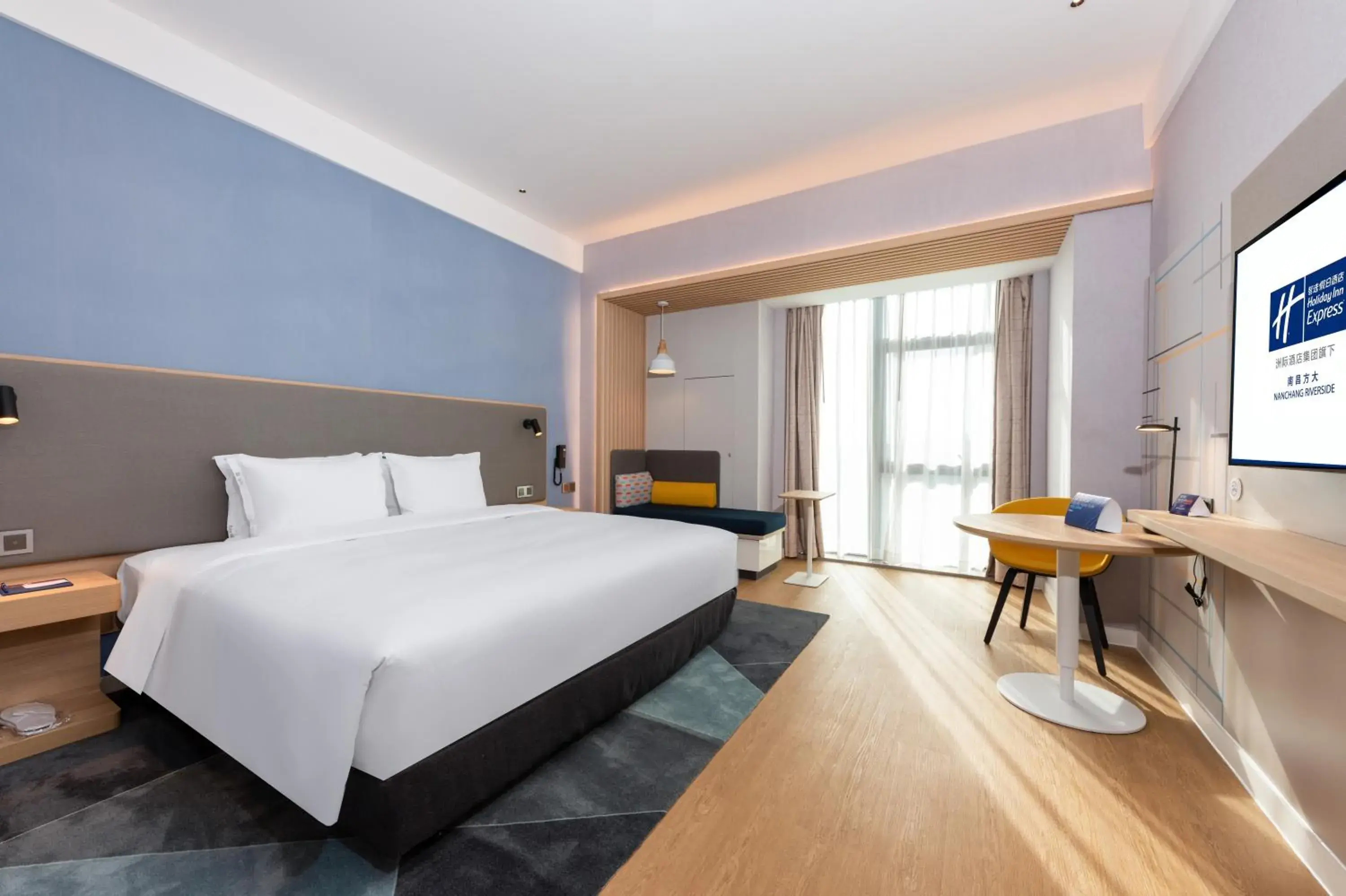 Bed in Holiday Inn Express Nanchang Riverside, an IHG Hotel