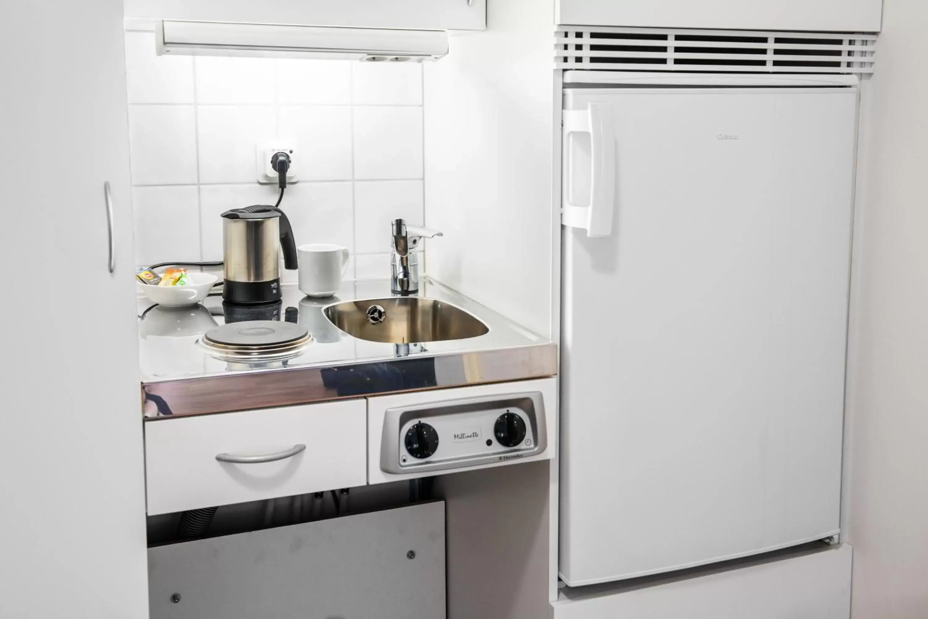 Kitchen or kitchenette, Kitchen/Kitchenette in Attendo Park Hotell