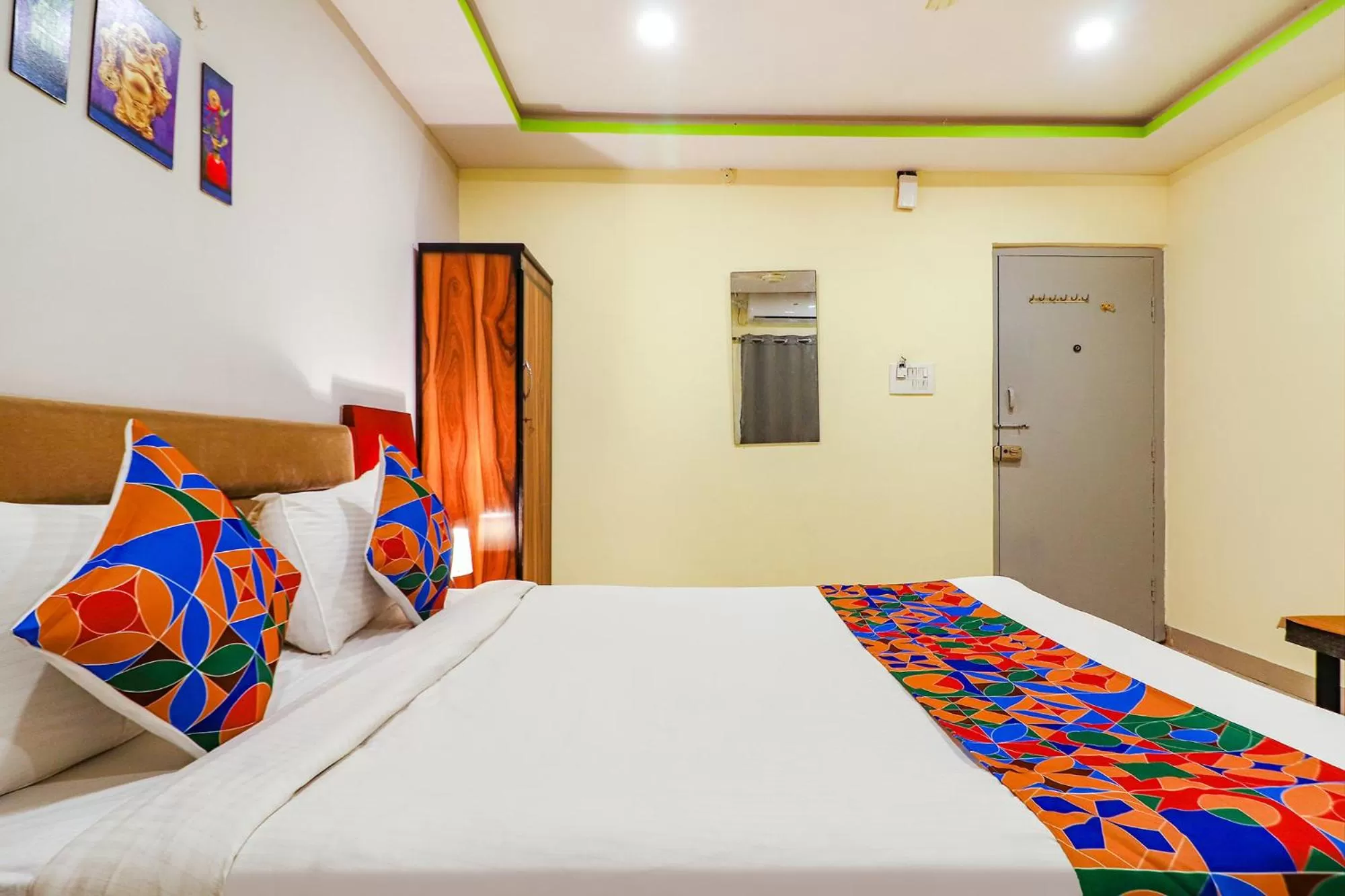Photo of the whole room, Bed in FabExpress Broholic Suites - Nr JNTU Kukatpally