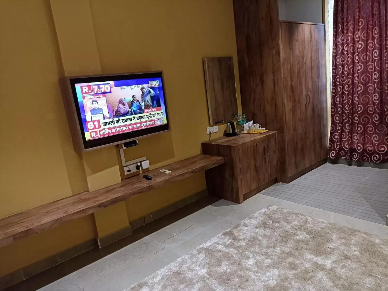 TV/Entertainment Center in Sangam Inn & Banquets TV/Entertainment Center in Sangam Inn & Banquets