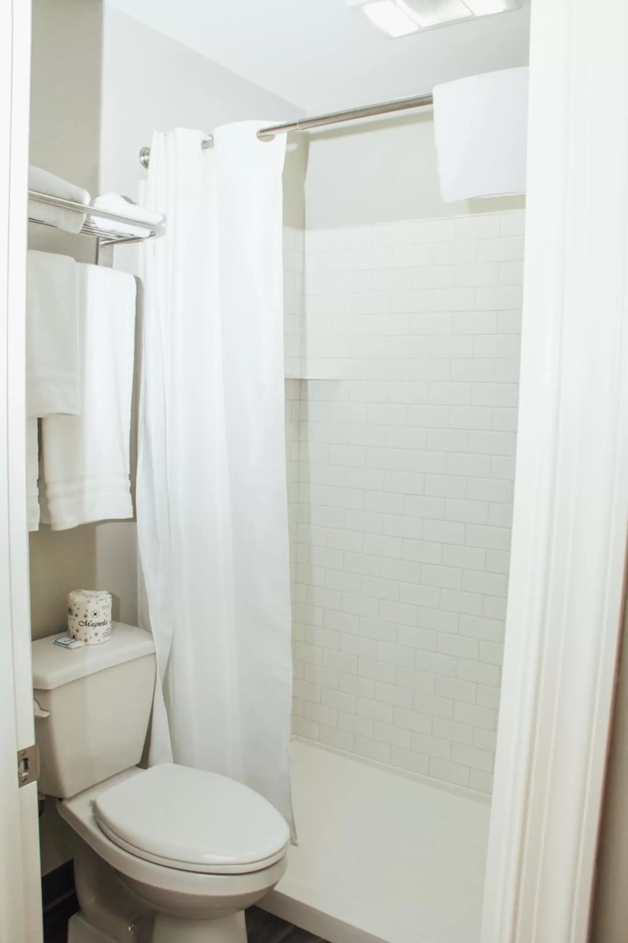 Bathroom in Country Squire Inn and Suites