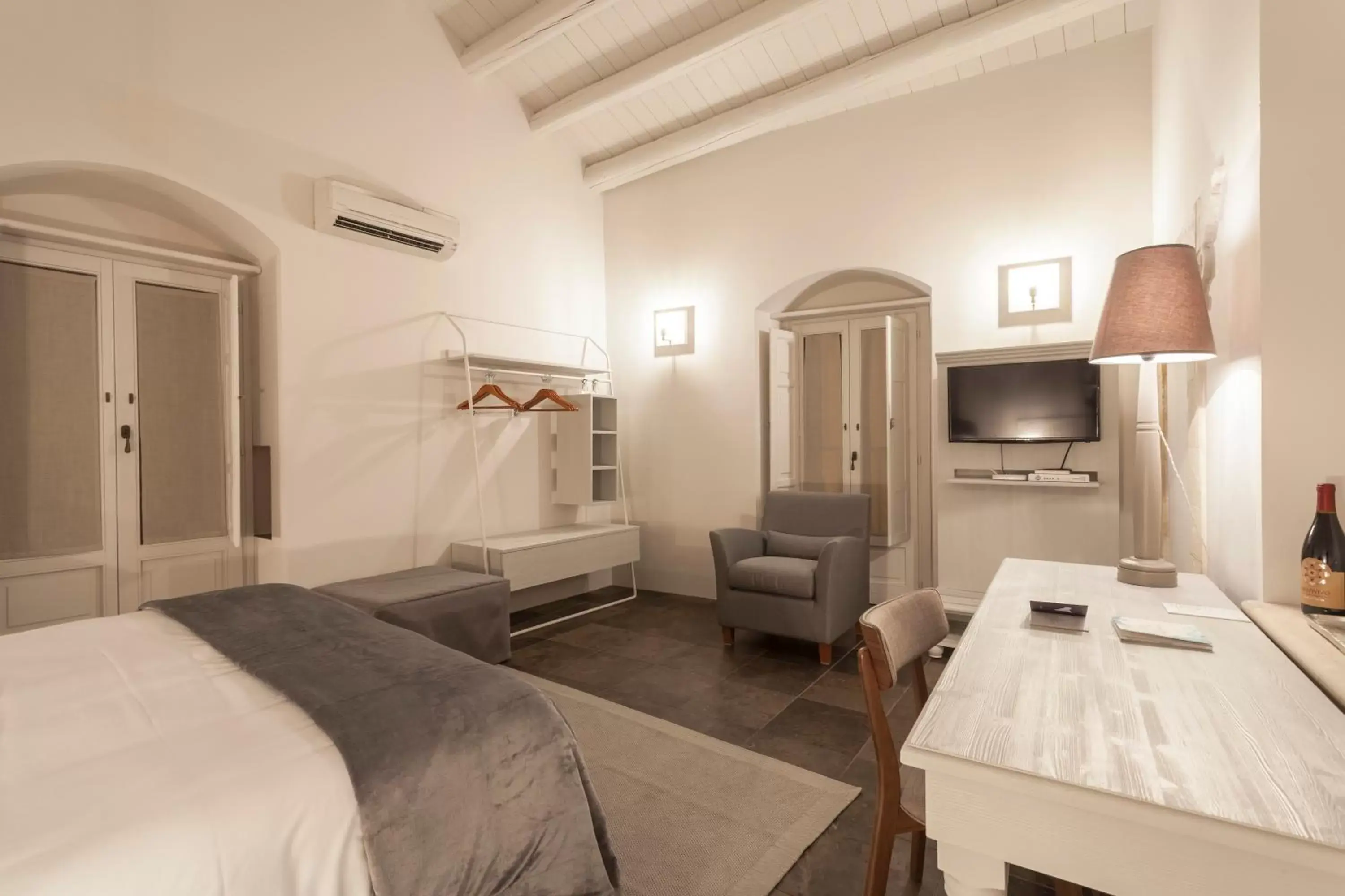 Bedroom, Seating Area in Relais & Châteaux Locanda Don Serafino